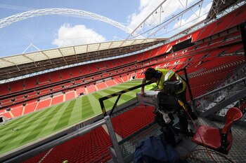 LONDON, UNITED KINGDOM - MAY 24:  In this handout image provided by UEFA, final preparations are made to television cameras at Wembley Stadium for the Champions League Final, May 24, 2011  in London, England. The UEFA Champions League final between FC Bar