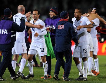 BLOEMFONTEIN, SOUTH AFRICA - JUNE 24:   Ricardo Clark (#13) and Landon Donovan (#10) of USA celebrate victory with teammates and substitutes at the end of the FIFA Confederations Cup Semi Final match against Spain at Free State Stadium on June 24, 2009 in