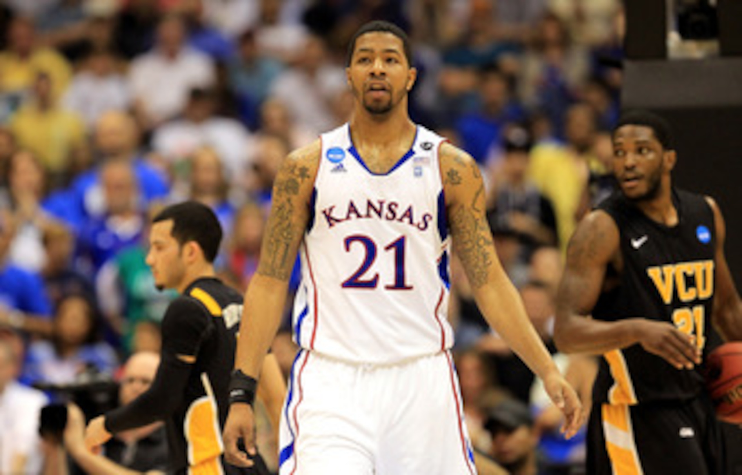 SAN ANTONIO, TX - MARCH 27:  Markieff Morris #21 of the Kansas Jayhawks reacts during the southwest regional final of the 2011 NCAA men's basketball tournament against the Virginia Commonwealth Rams at the Alamodome on March 27, 2011 in San Antonio, Texas