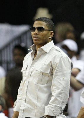 CHARLOTTE - APRIL 24:  Rapper Nelly watches the action on the court during Game Three of the Eastern Conference Quarterfinals between the Orlando Magic and the Charlotte Bobcats during the 2010 NBA Playoffs at Time Warner Cable Arena on April 24, 2010 in