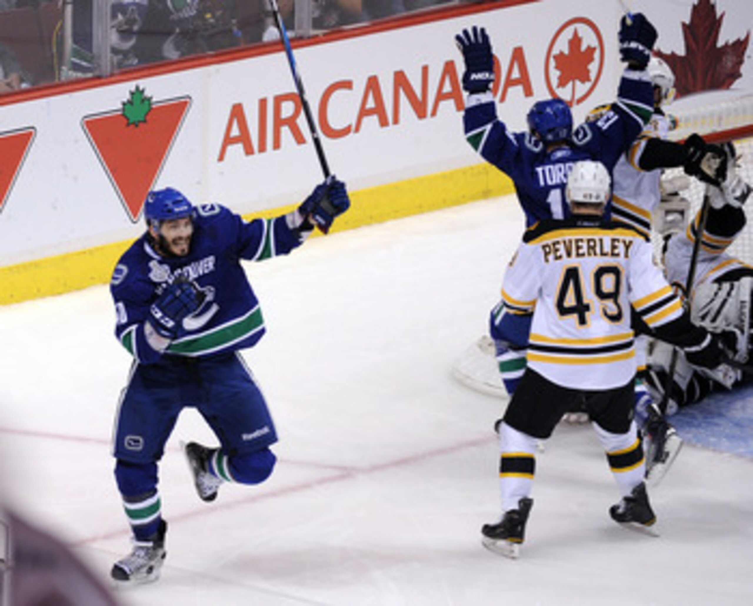 VANCOUVER, BC - JUNE 10:  Maxim Lapierre #40 of the Vancouver Canucks celebrates after scoring a goal in the third period against the Boston Bruins during Game Five of the 2011 NHL Stanley Cup Final at Rogers Arena on June 10, 2011 in Vancouver, British C