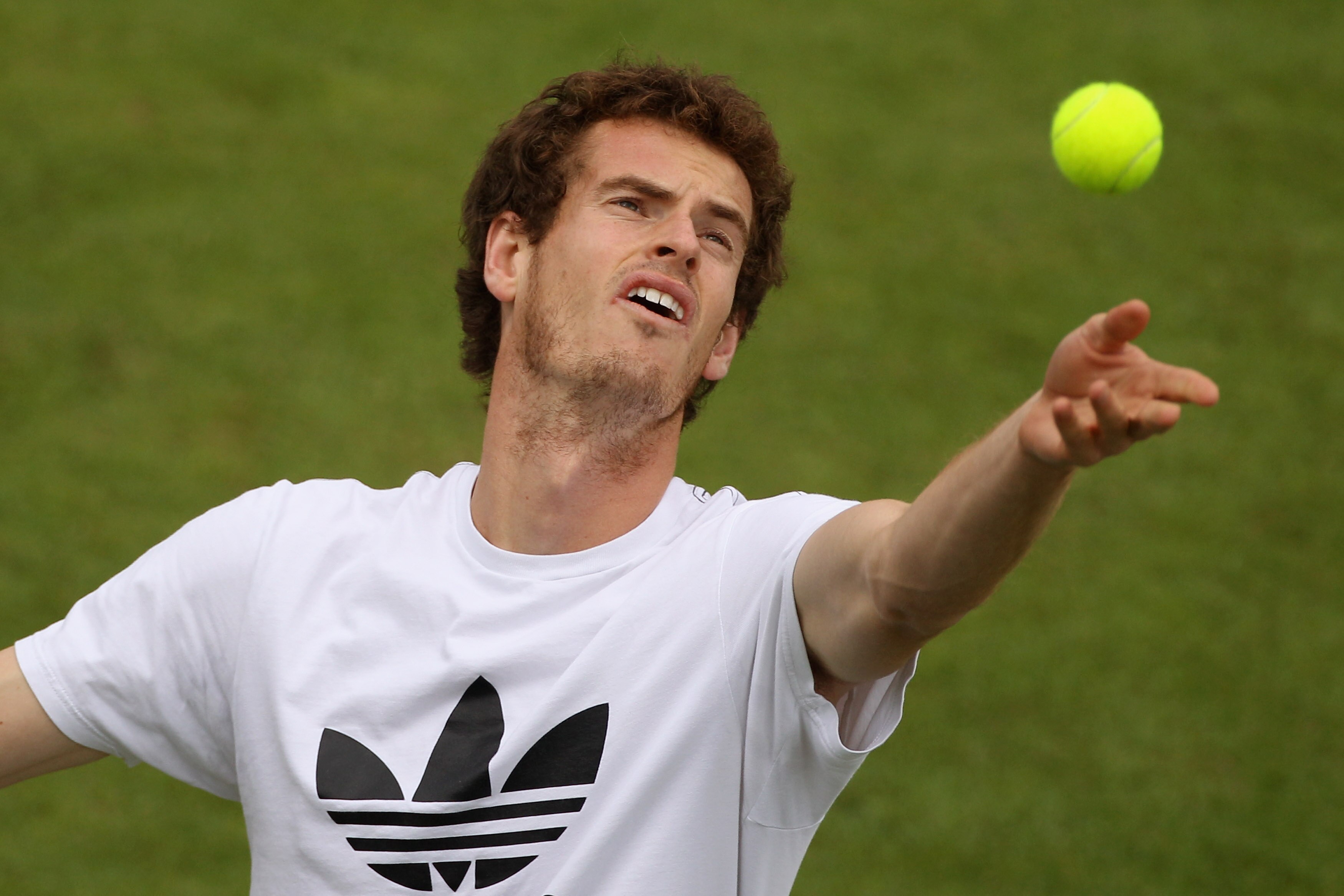 WIMBLEDON, ENGLAND - JUNE 18:  British tennis player Andy Murray trains on court 14 at the All England Lawn Tennis and Croquet Club ahead of the Wimbledon Lawn Tennis Championships on June 18, 2011 in London, England. The Championships which are celebrati