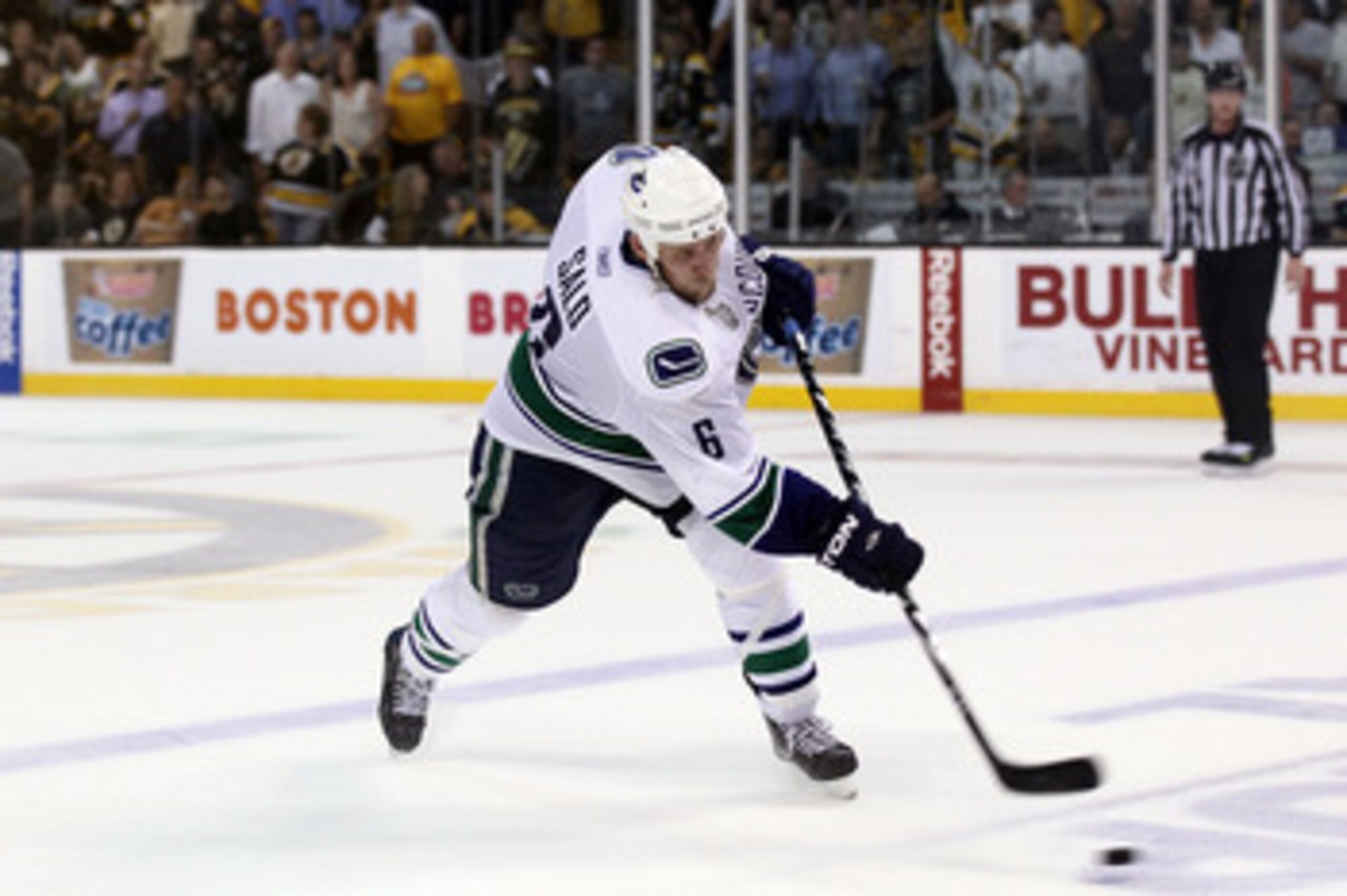 BOSTON, MA - JUNE 08:  Sami Salo #6 of the Vancouver Canucks takes a slap shot against the Boston Bruins during Game Four of the 2011 NHL Stanley Cup Final at TD Garden on June 8, 2011 in Boston, Massachusetts.  (Photo by Elsa/Getty Images)