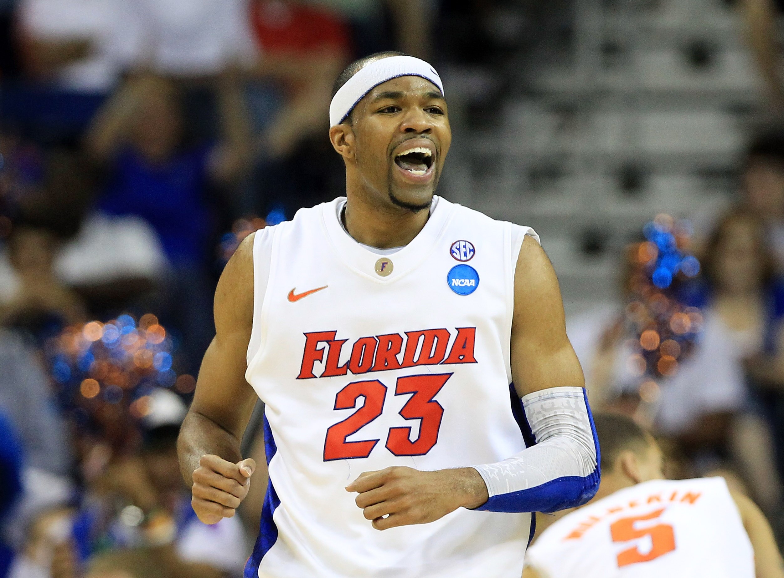 NEW ORLEANS, LA - MARCH 26:  Alex Tyus #23 of the Florida Gators celebrates during the second half of their game against the Butler Bulldogs in the Southeast regional final of the 2011 NCAA men's basketball tournament at New Orleans Arena on March 26, 201