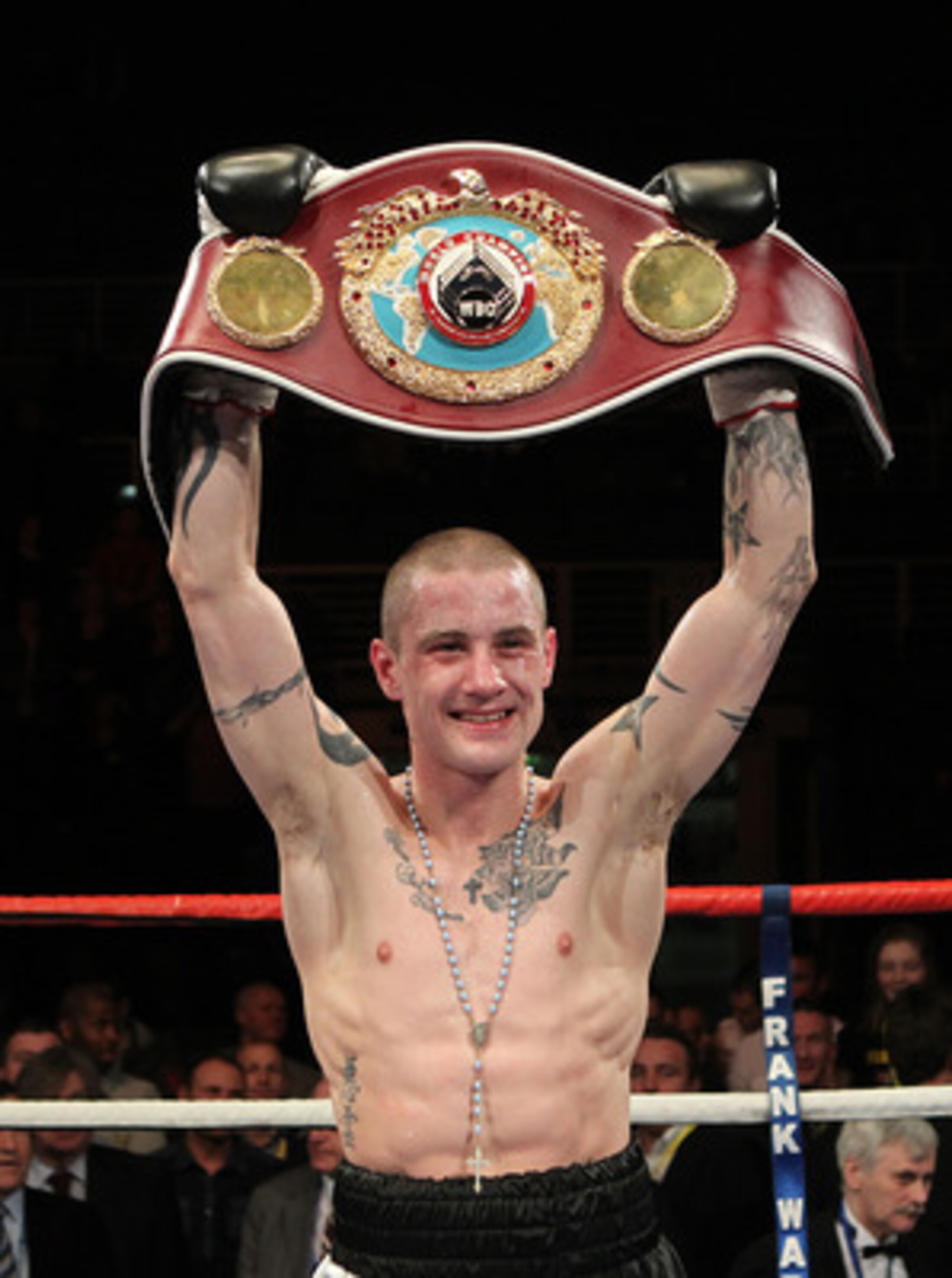 GLASGOW, SCOTLAND - MARCH 12:  Ricky Burns defeats Joseph Laryea to retain the WBO Super Featherweight Championship of The World contest at the Braehead Arena on December 12, 2011 in Glasgow, Scotland. (Photo by Ian MacNicol/Getty Images)