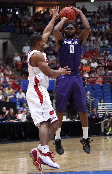 TUCSON, AZ - MARCH 19:  Jacob Pullen #0 of the Kansas State Wildcats shoots against the Wisconsin Badgers during the third round of the 2011 NCAA men's basketball tournament at McKale Center on March 19, 2011 in Tucson, Arizona.  (Photo by Christian Peter