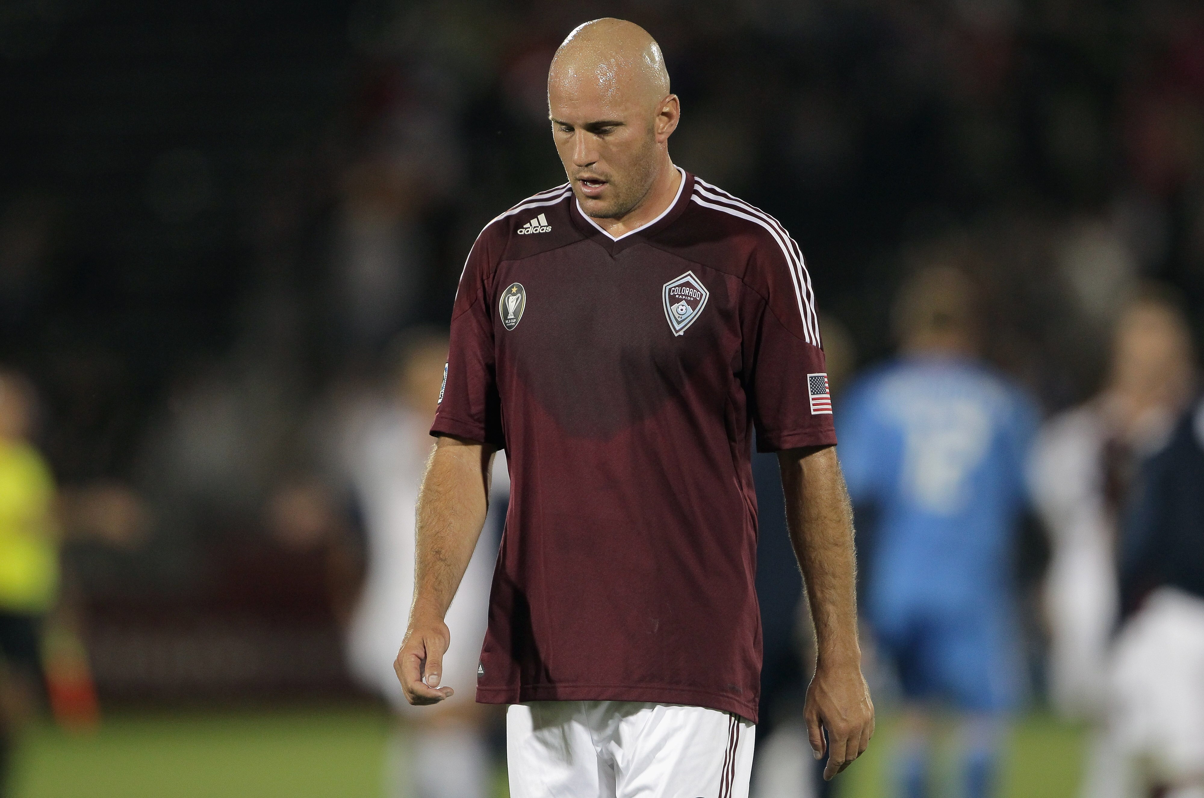 COMMERCE CITY, CO - JUNE 18:  Conor Casey #9 of the Colorado Rapids leaves the field after the Rapids were defeated 3-1 by the Los Angeles Galaxy at Dick's Sporting Goods Park on June 18, 2011 in Commerce City, Colorado.  (Photo by Doug Pensinger/Getty Im