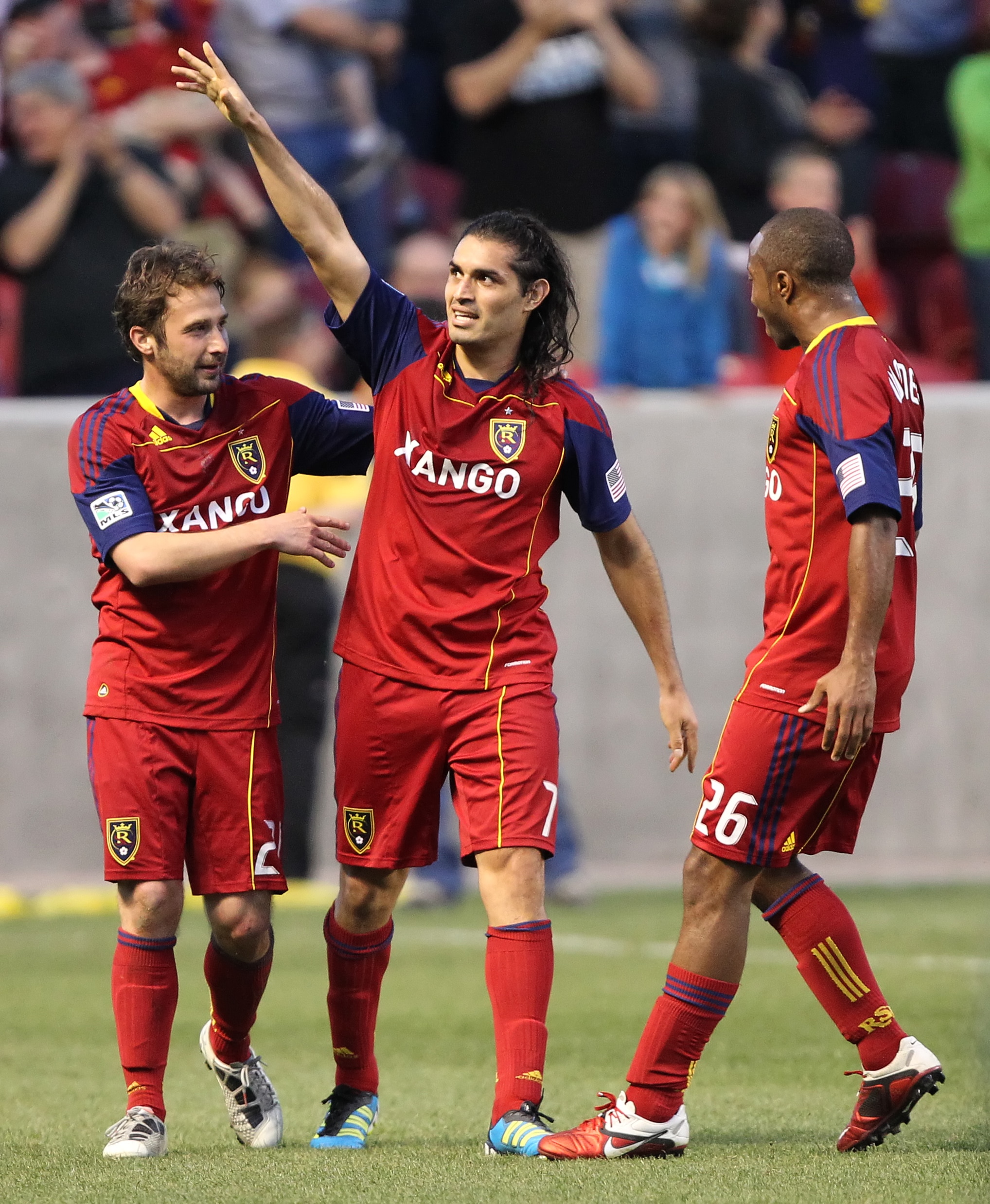SANDY, UT - JUNE 4: Fabian Espindola #7 of Real Salt Lake celebrates his goal with Ned Grabavoy #20 and Collen Warner #26 against the Vancouver Whitecaps during the second half of an MLS soccer game June 4, 2011 at Rio Tinto Stadium in Sandy, Utah. Real b