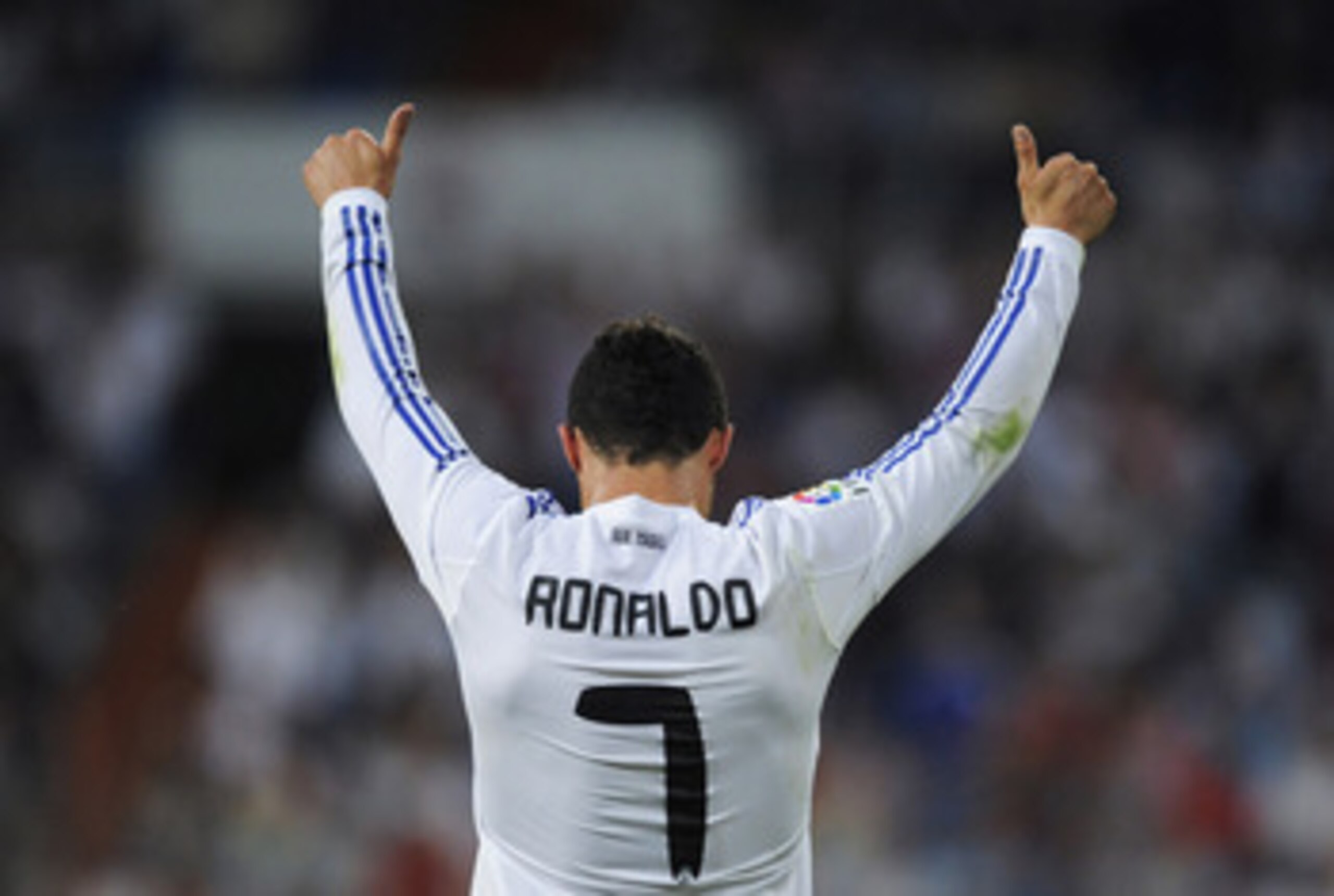MADRID, SPAIN - MAY 21:  Cristiano Ronaldo of Real Madrid celebrates after scoring his 2nd goal during the La Liga match between Real Madrid and UD Almeria at Estadio Santiago Bernabeu on May 21, 2011 in Madrid, Spain.  (Photo by Denis Doyle/Getty Images)