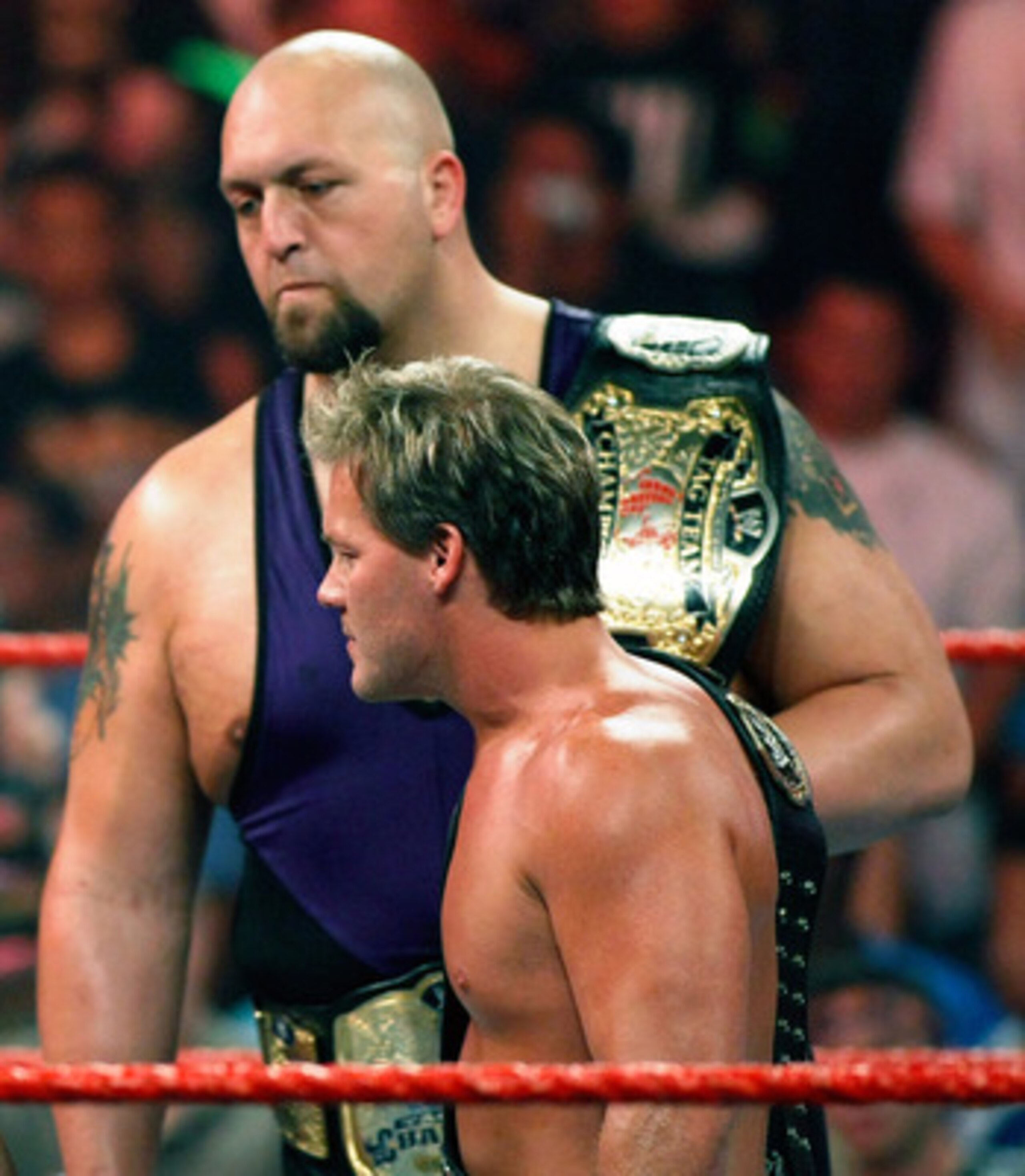 LAS VEGAS - AUGUST 24:  Boxer Floyd Mayweather Jr. (L) stares down wrestlers Chris Jericho and Big Show during the WWE Monday Night Raw show at the Thomas & Mack Center August 24, 2009 in Las Vegas, Nevada. Mayweather was a special guest host during the b