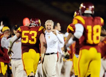 LOS ANGELES, CA - NOVEMBER 28:  Pete Carroll (C) of the USC Trojans celebrates with Jeff Byers #53 after Damian Williams #18 wide receiver of the USC Trojans scored a 48-yard touchdown pass after UCLA Bruins called a time out with one minute remaining in