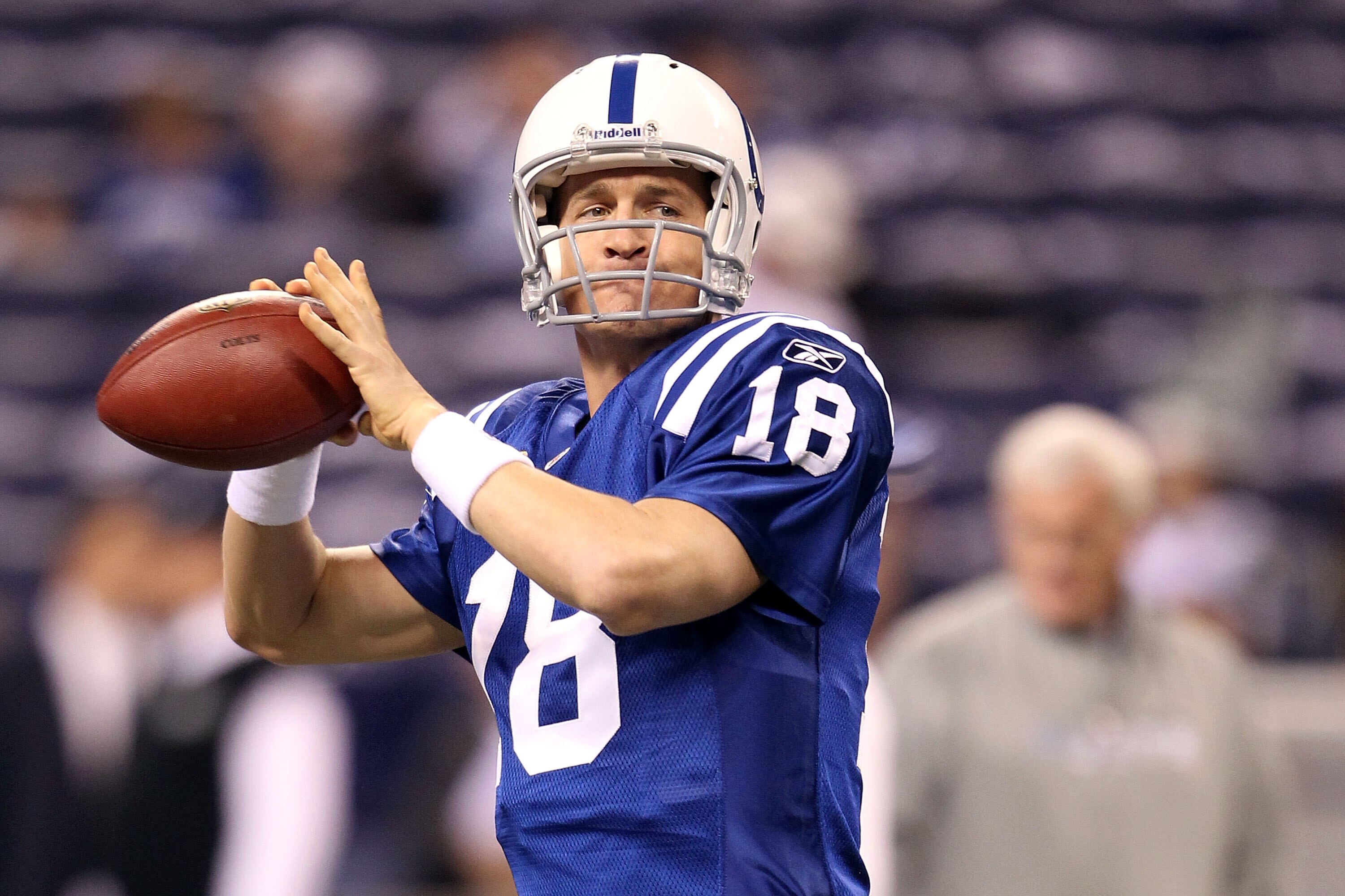 INDIANAPOLIS, IN - JANUARY 08:  Peyton Manning #18 of the Indianapolis Colts warms up against the New York Jets during their 2011 AFC wild card playoff game at Lucas Oil Stadium on January 8, 2011 in Indianapolis, Indiana.  (Photo by Andy Lyons/Getty Imag