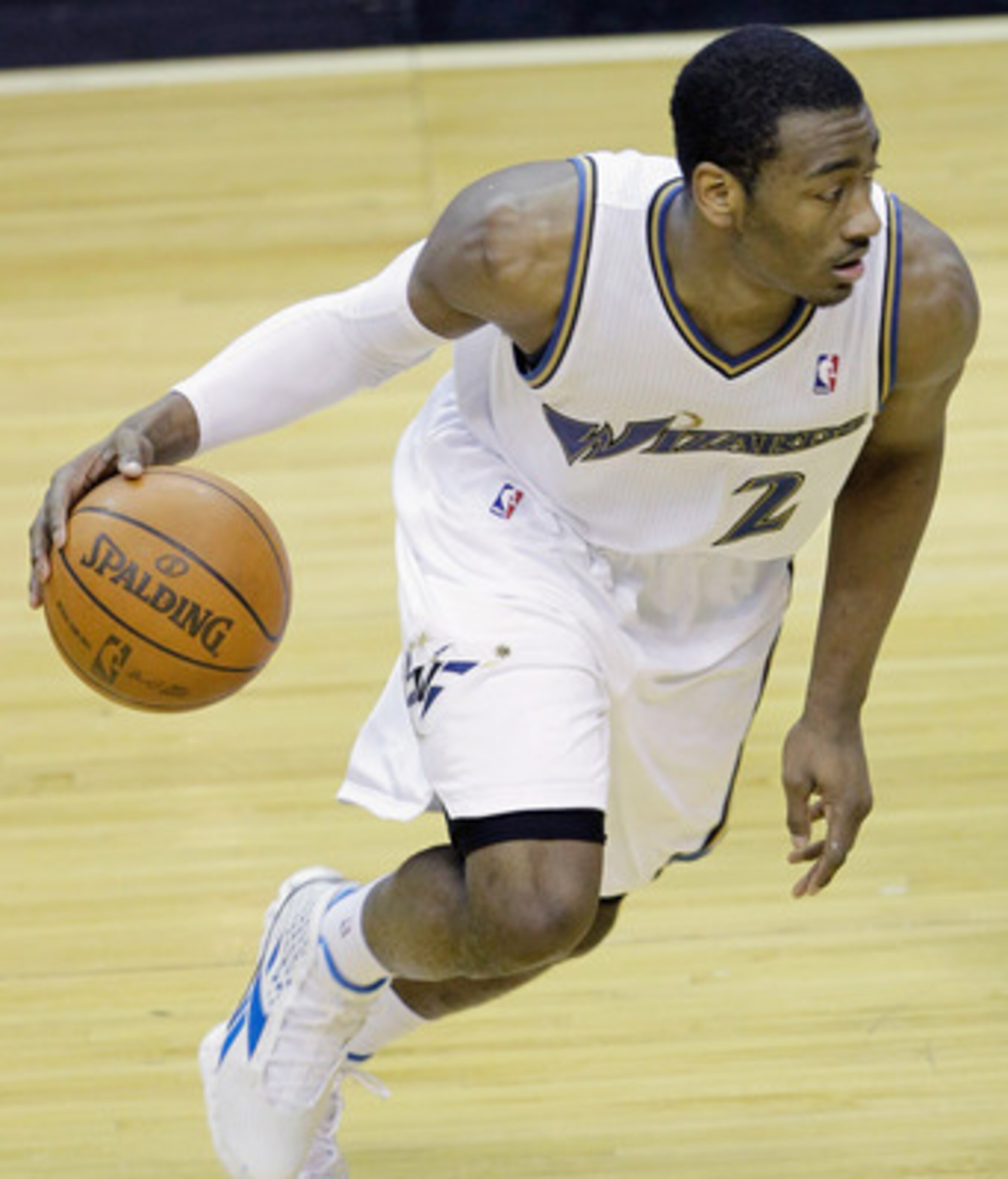 WASHINGTON, DC - MARCH 14: John Wall #2 of the Washington Wizards dribbles against the Oklahoma City Thunder during the second half at the Verizon Center on March 14, 2011 in Washington, DC. NOTE TO USER: User expressly acknowledges and agrees that, by do