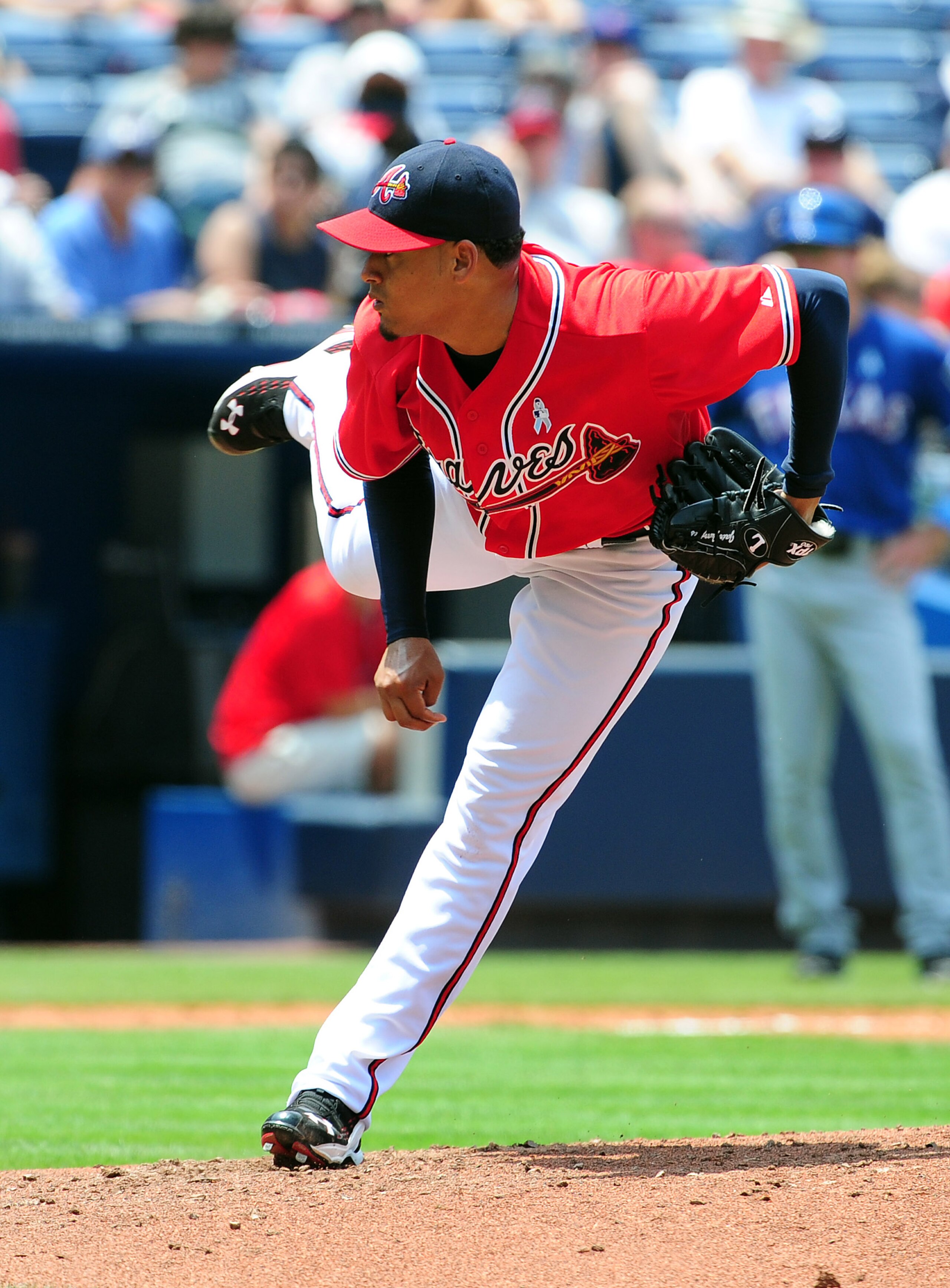 ATLANTA - JUNE 19: Jair Jurrjens #49 of the Atlanta Braves pitches against the Texas Rangers at Turner Field on June 19, 2011 in Atlanta, Georgia. (Photo by Scott Cunningham/Getty Images)