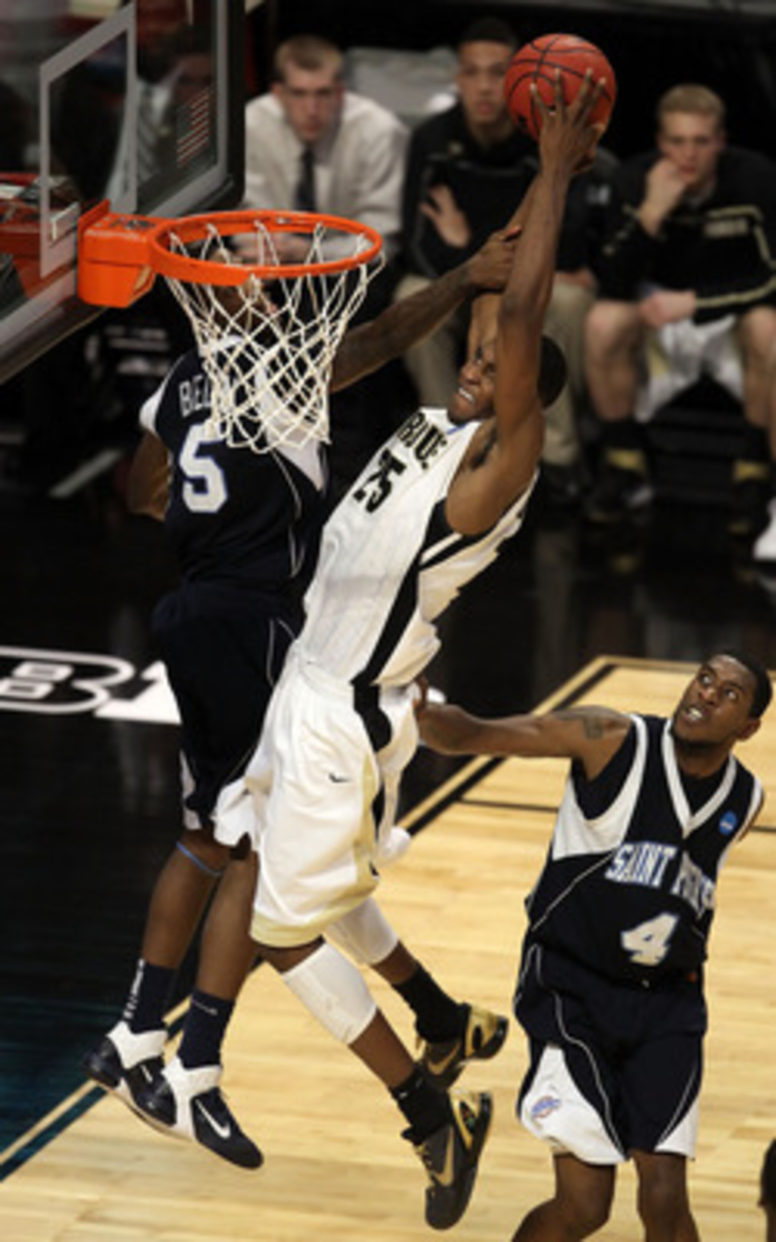 CHICAGO, IL - MARCH 18:  JaJuan Johnson #25 of the Purdue Boilermakers shoots against Jeron Belin #5 of the St. Peter's Peacocks in the second half during the second round of the 2011 NCAA men's basketball tournament at the United Center on March 18, 2011