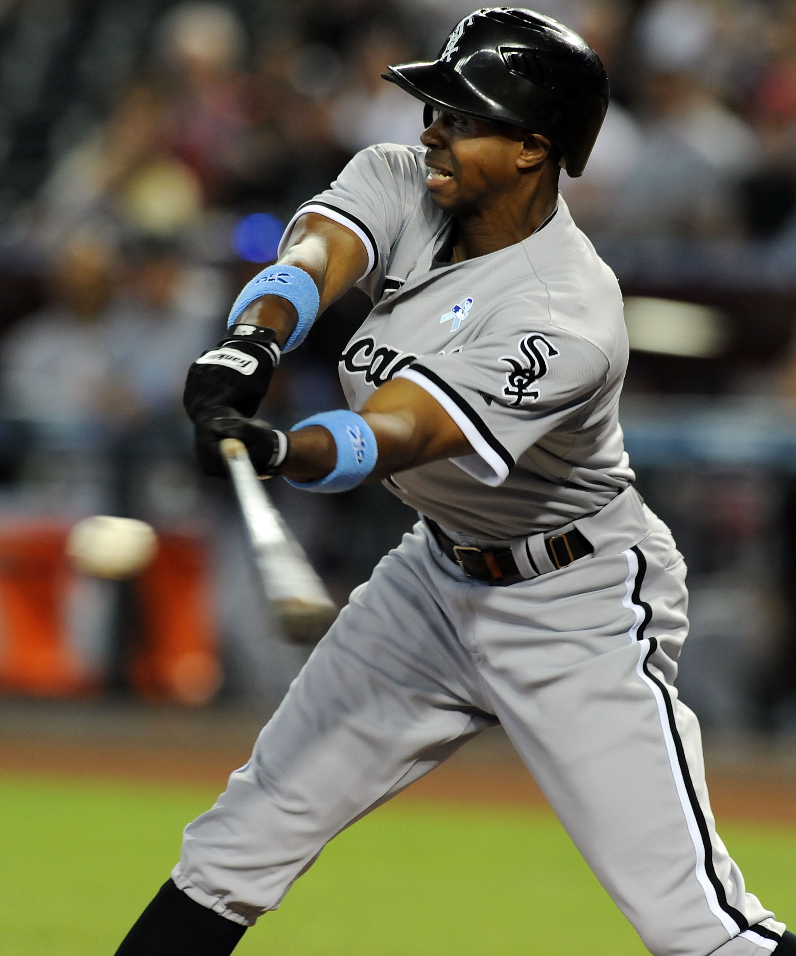 PHOENIX, AZ - JUNE 19:  Juan Pierre #1 of the Chicago White Sox makes contact with the ball in the first inning against the Arizona Diamondbacks at Chase Field on June 19, 2011 in Phoenix, Arizona.  (Photo by Norm Hall/Getty Images)