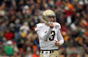EL PASO, TX - DECEMBER 30:  Quarterback Tommy Rees #13 of the Notre Dame Fighting Irish celebrates a touchdown against the Miami Hurricanes at Sun Bowl on December 30, 2010 in El Paso, Texas.  (Photo by Ronald Martinez/Getty Images)