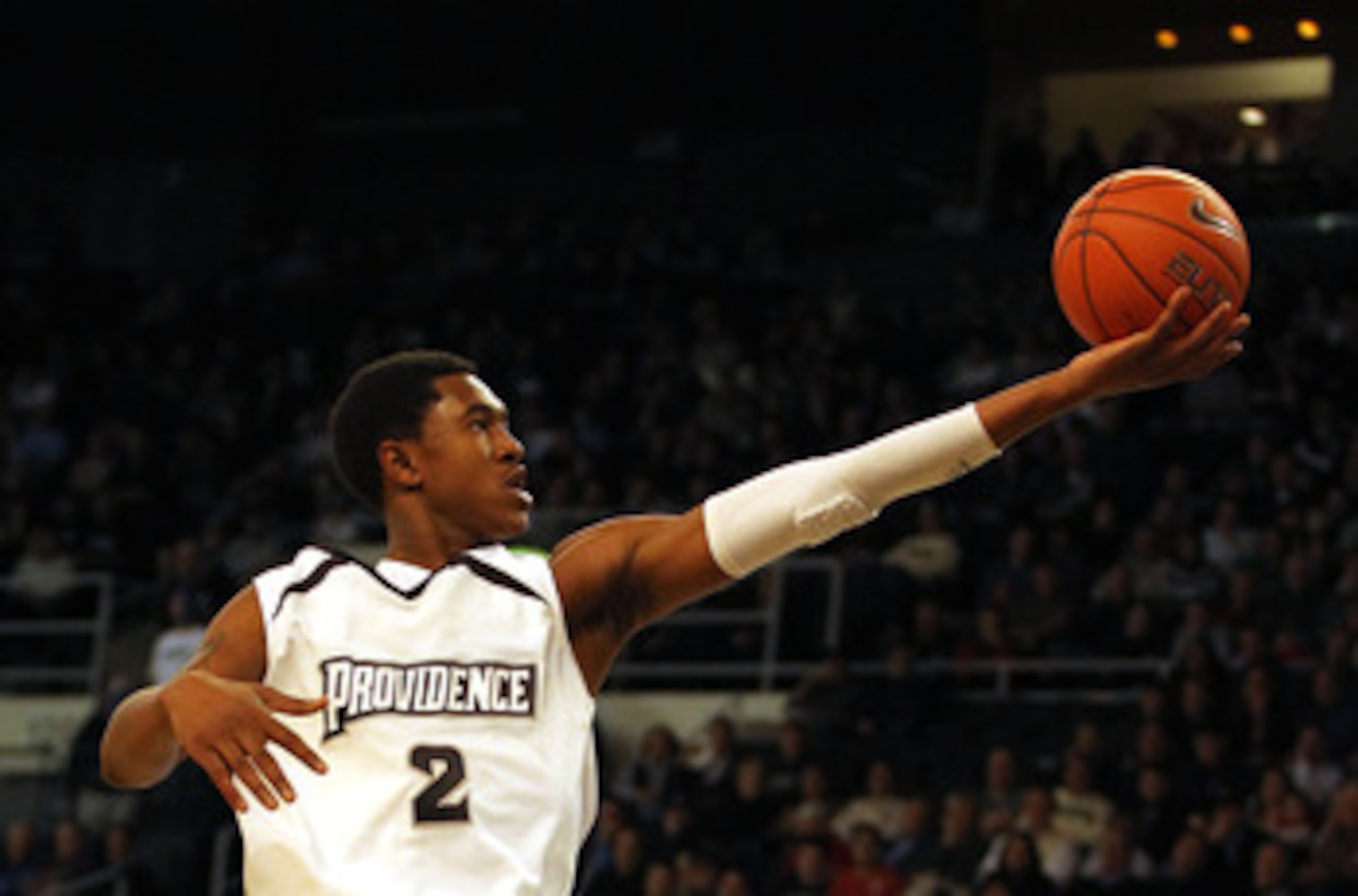 PROVIDENCE, RI - DECEMBER 04:  Marshon Brooks #2 of the Providence Friars drives for a shot attempt against the Rhode Island Rams at the Dunkin' Donuts Center on December 4, 2010 in Providence, Rhode Island. (Photo by Chris Chambers/Getty Images)