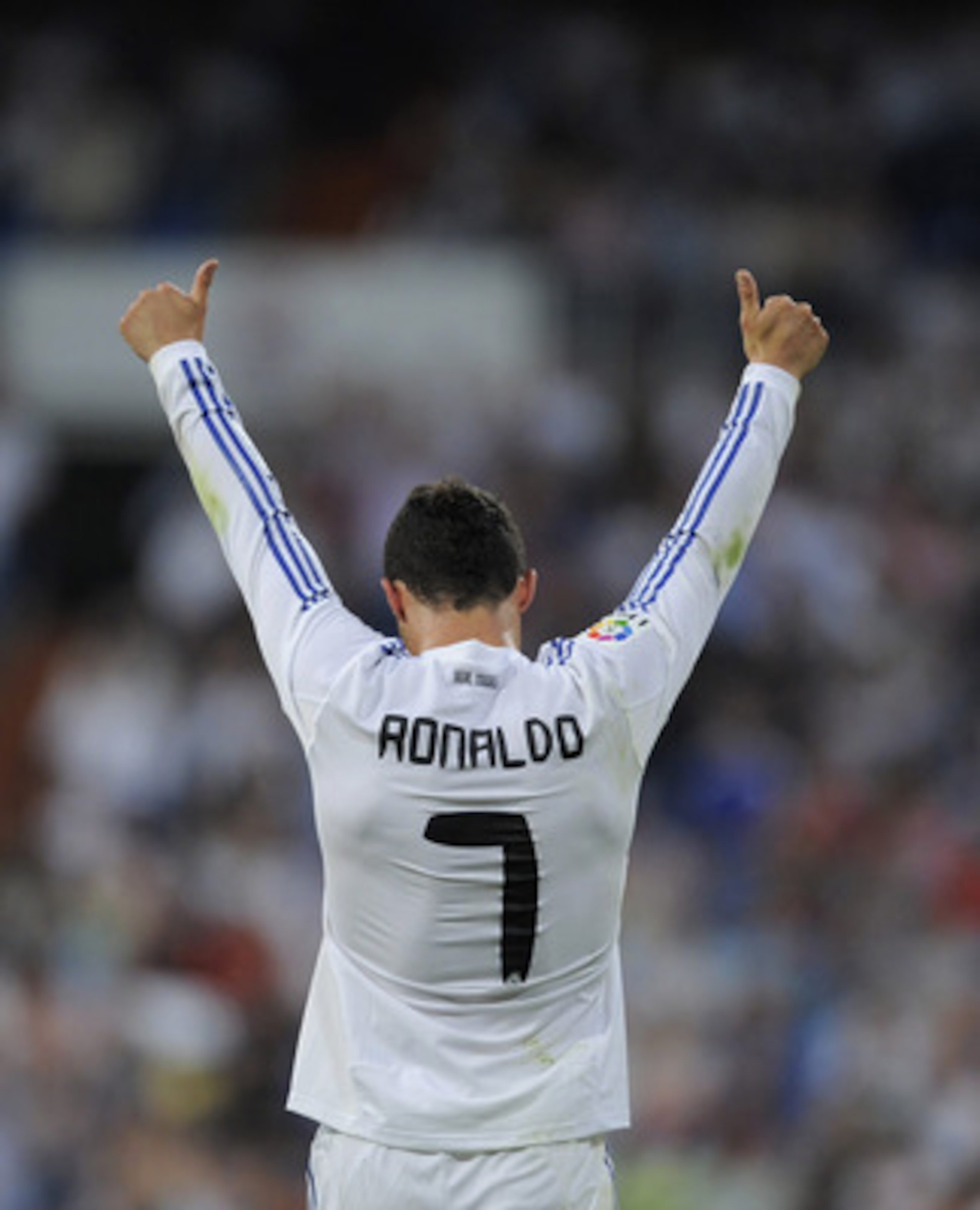 MADRID, SPAIN - MAY 21:  Cristiano Ronaldo of Real Madrid celebrates after scoring his 2nd goal during the La Liga match between Real Madrid and UD Almeria at Estadio Santiago Bernabeu on May 21, 2011 in Madrid, Spain.  (Photo by Denis Doyle/Getty Images)