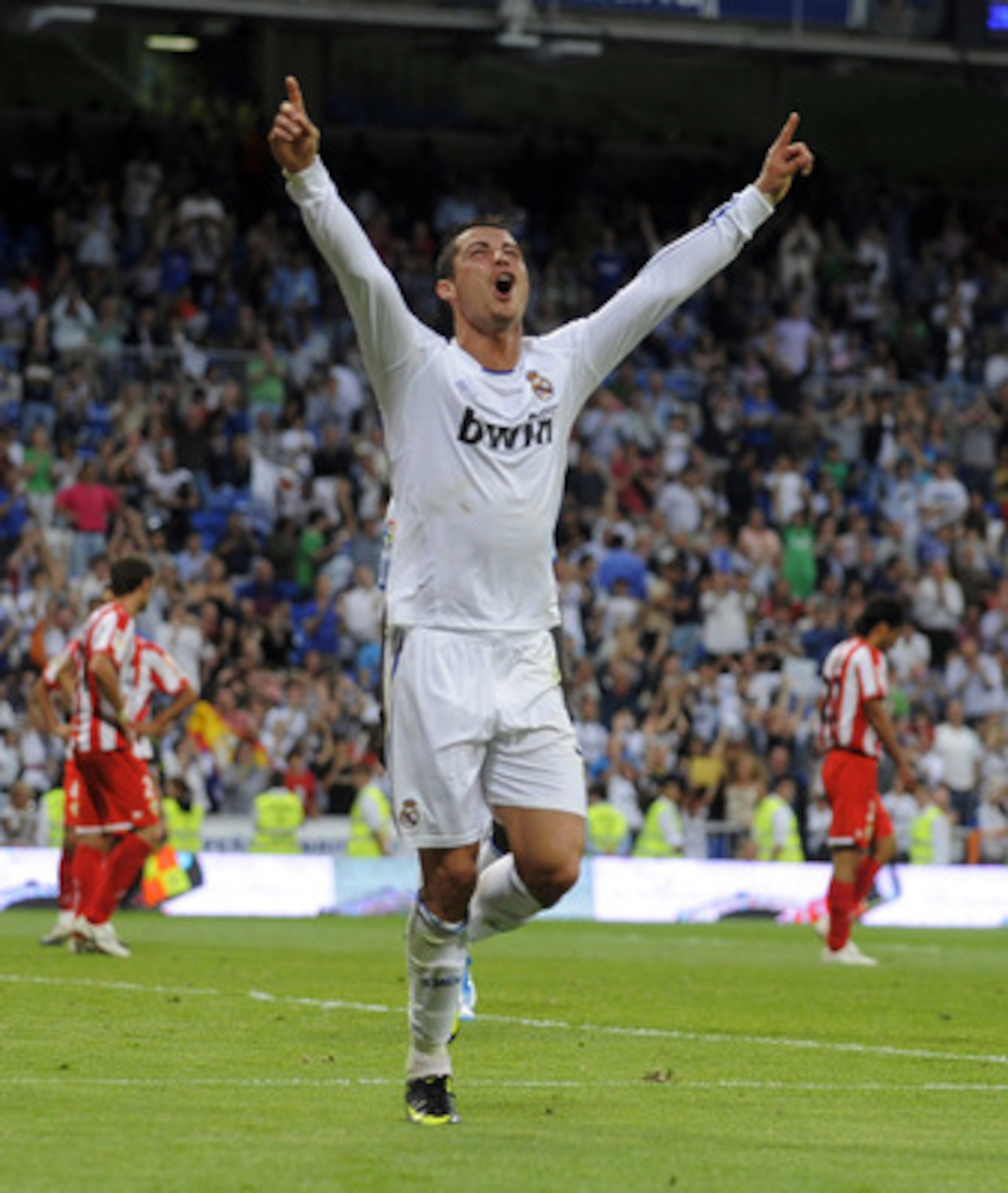 MADRID, SPAIN - MAY 21:  Cristiano Ronaldo of Real Madrid celebrates after scoring his 2nd goal during the La Liga match between Real Madrid and UD Almeria at Estadio Santiago Bernabeu on May 21, 2011 in Madrid, Spain.  (Photo by Denis Doyle/Getty Images)