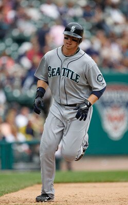 DETROIT - JUNE 12: Justin Smoak #17 of the Seattle Mariners rounds third base after hitting a two run home run in the ninth inning during the game against the Detroit Tigers at Comerica Park on June 12, 2011 in Detroit, Michigan. Seattle defeated the Tige