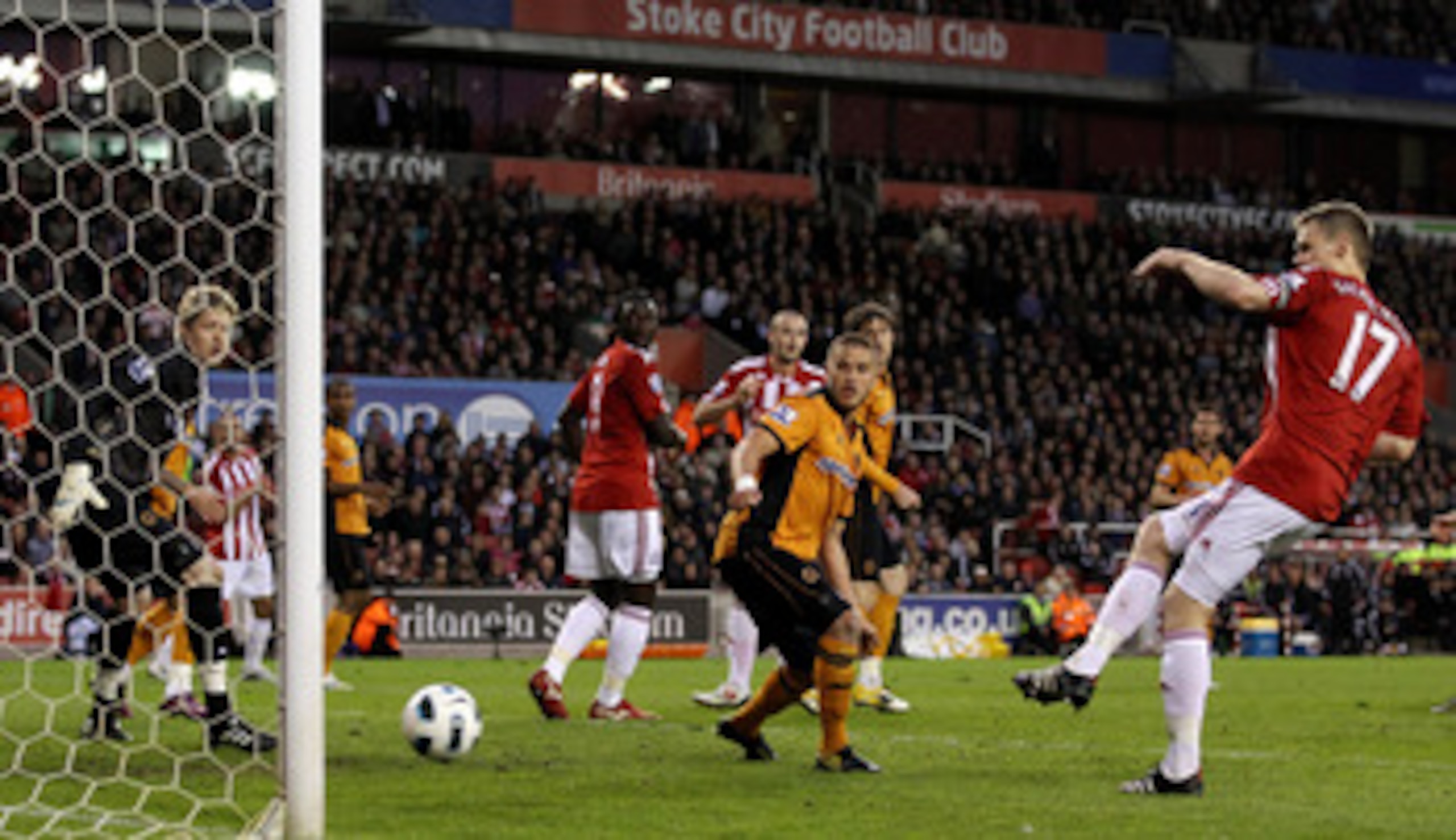 STOKE ON TRENT, ENGLAND - APRIL 26:  Ryan Shawcross of Stoke City (R) scores his team's second goal during the Barclays Premier League match between Stoke City and Wolverhampton Wanderers at Britannia Stadium on April 26, 2011 in Stoke on Trent, England. 