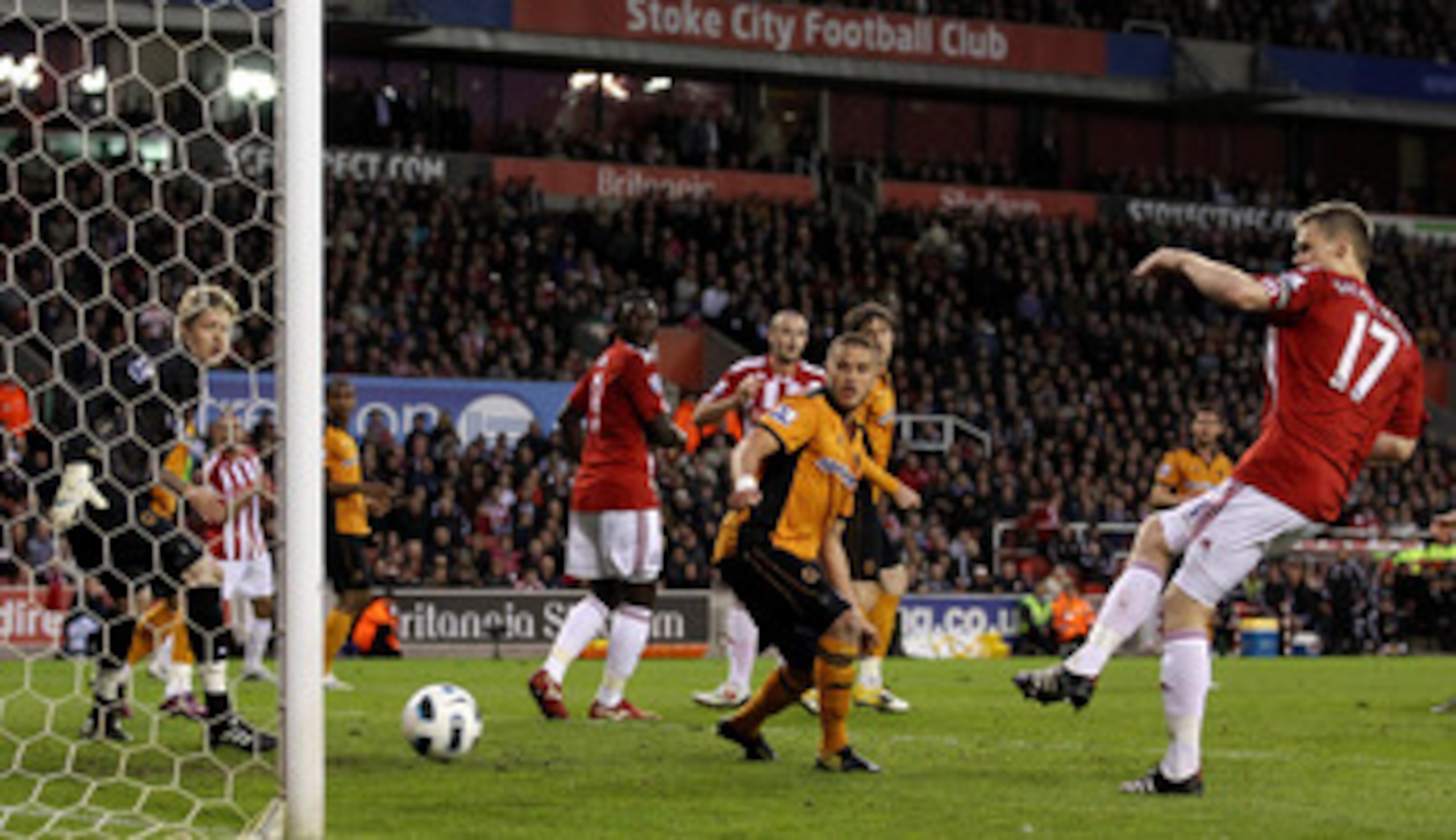 STOKE ON TRENT, ENGLAND - APRIL 26:  Ryan Shawcross of Stoke City (R) scores his team's second goal during the Barclays Premier League match between Stoke City and Wolverhampton Wanderers at Britannia Stadium on April 26, 2011 in Stoke on Trent, England. 