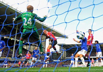 LIVERPOOL, ENGLAND - SEPTEMBER 11:  Nemanja Vidic of Manchester United scores to make it 2-1 during the Barclays Premier League match between Everton and Manchester United at Goodison Park on September 11, 2010 in Liverpool, England.  (Photo by Michael Re