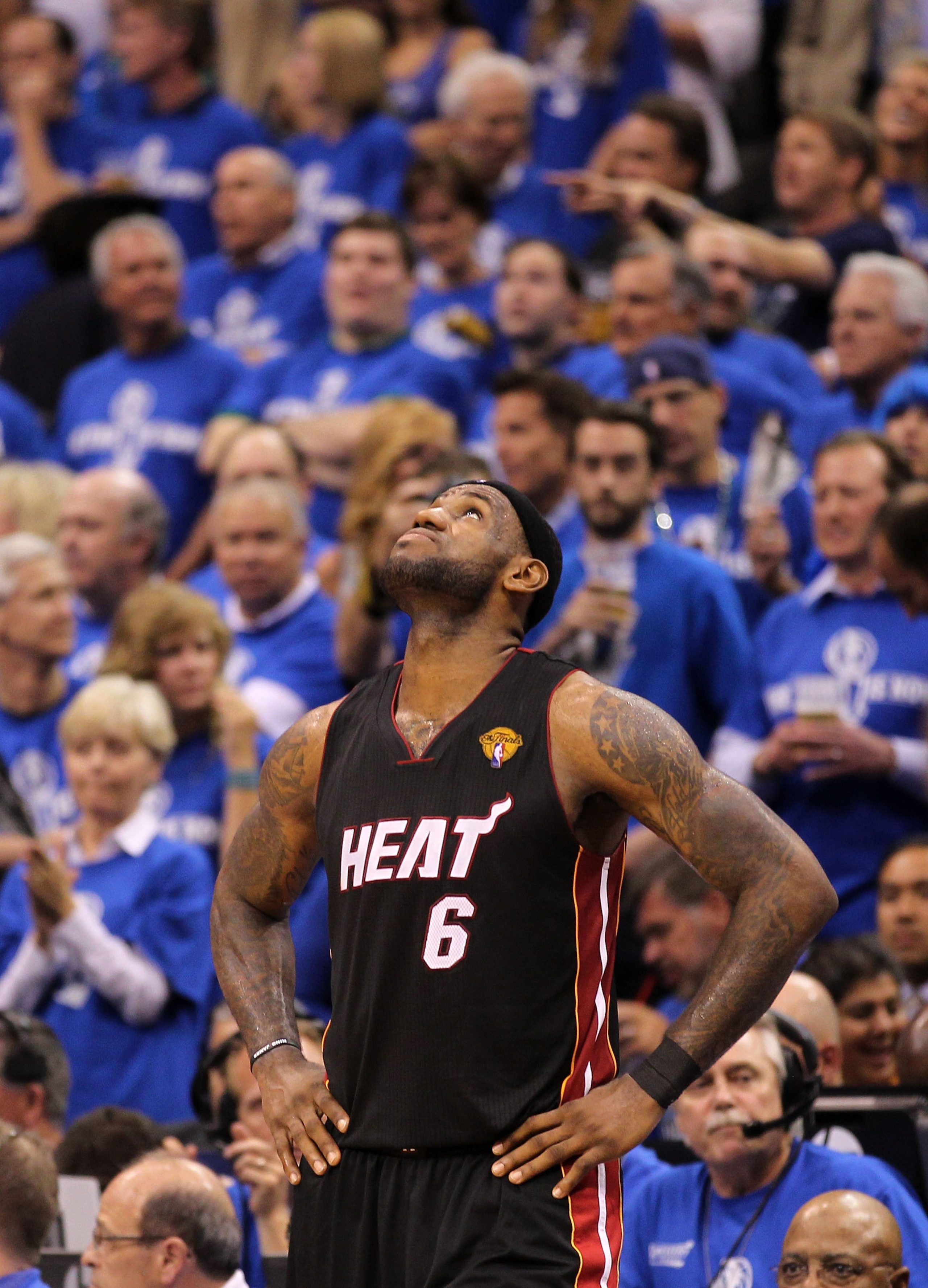 DALLAS, TX - JUNE 09: LeBron James #6 of the Miami Heat looks on against the Dallas Mavericks  in Game Five of the 2011 NBA Finals at American Airlines Center on June 9, 2011 in Dallas, Texas.  NOTE TO USER: User expressly acknowledges and agrees that, by