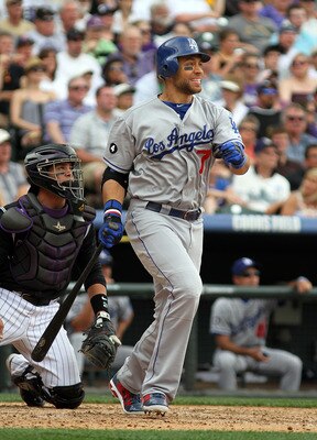 DENVER, CO - JUNE 12: James Loney #7 of the Los Angeles Dodgers takes off for first base after hitting the ball against the Colorado Rockies on June 12, 2011 at Coors Field in Denver, Colorado. The Dodgers won the game 10-8. (Photo by Marc Piscotty/Getty 