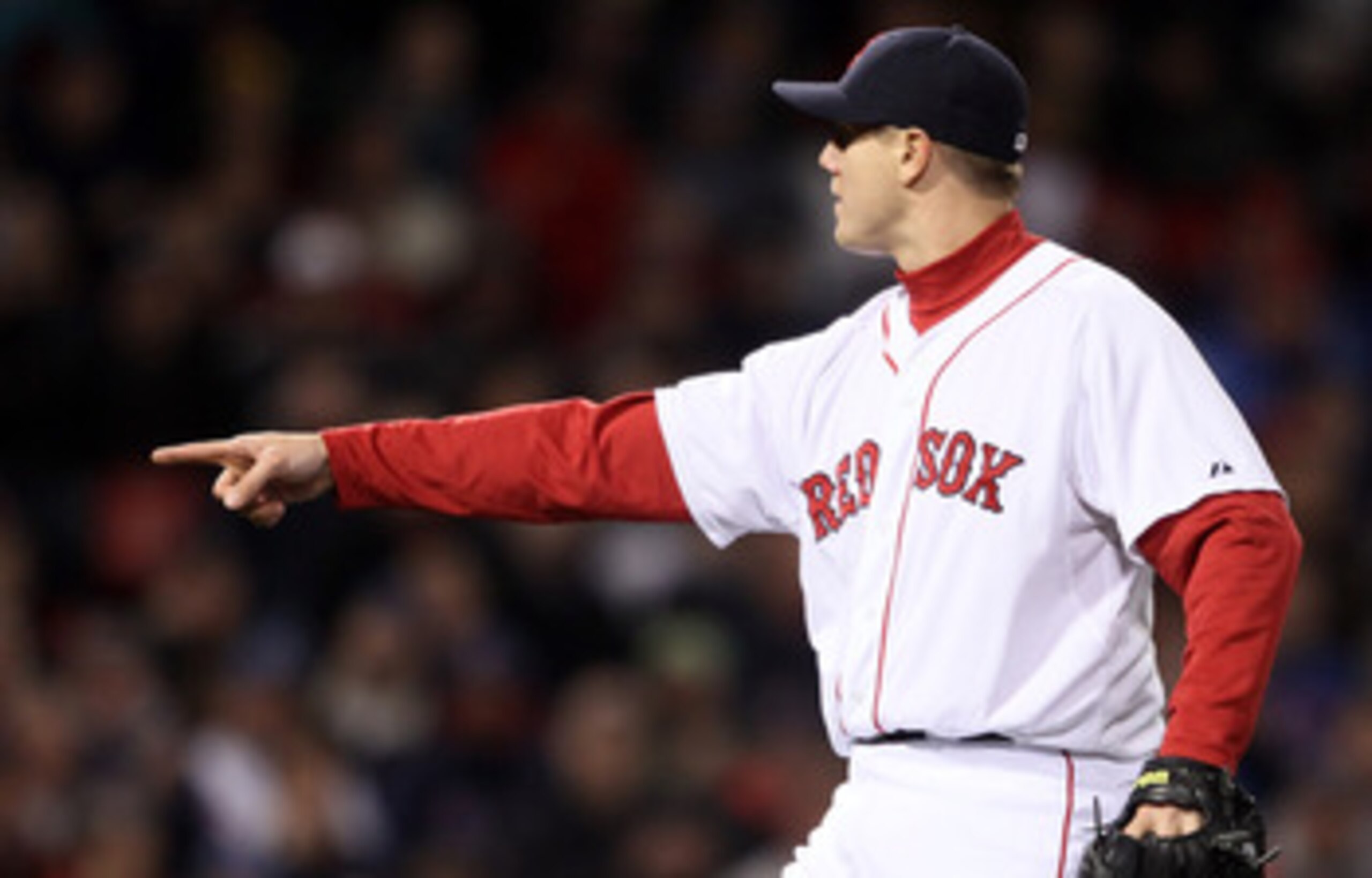 BOSTON, MA - MAY 22:  Jonathan Papelbon #58 of the Boston Red Sox points to the ball in the ninth inning against the Chicago Cubs on May 22, 2011 at Fenway Park in Boston, Massachusetts.  Before this series, the two teams haven't played at Fenway Park sin