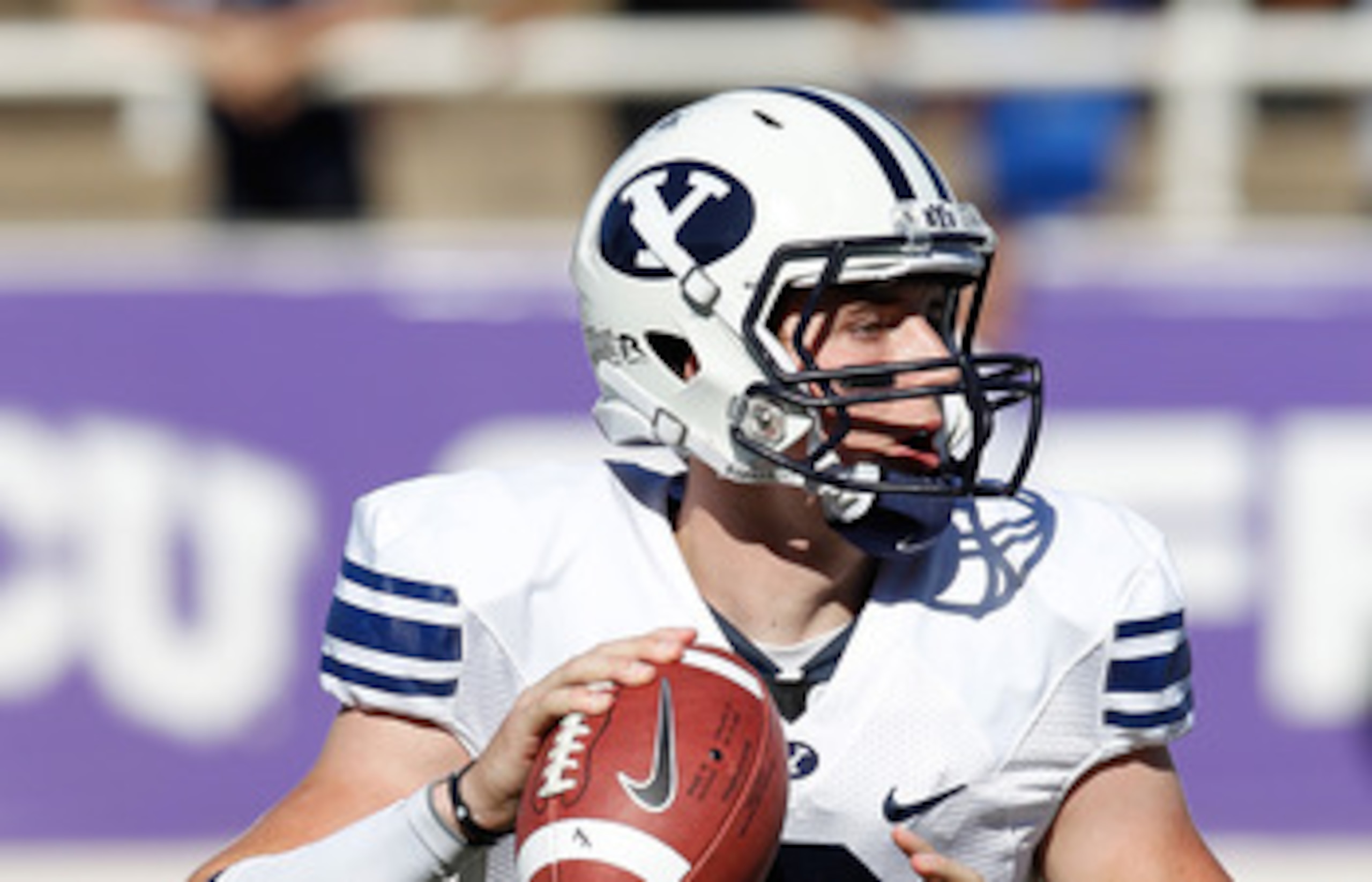 FORT WORTH, TX - OCTOBER 16:  Quarterback Jake Heaps #9 of the Brigham Young University Cougars throws a pass against the Texas Christian University Horned Frogs at Amon G. Carter Stadium on October 16, 2010 in Fort Worth, Texas.  (Photo by Tom Pennington