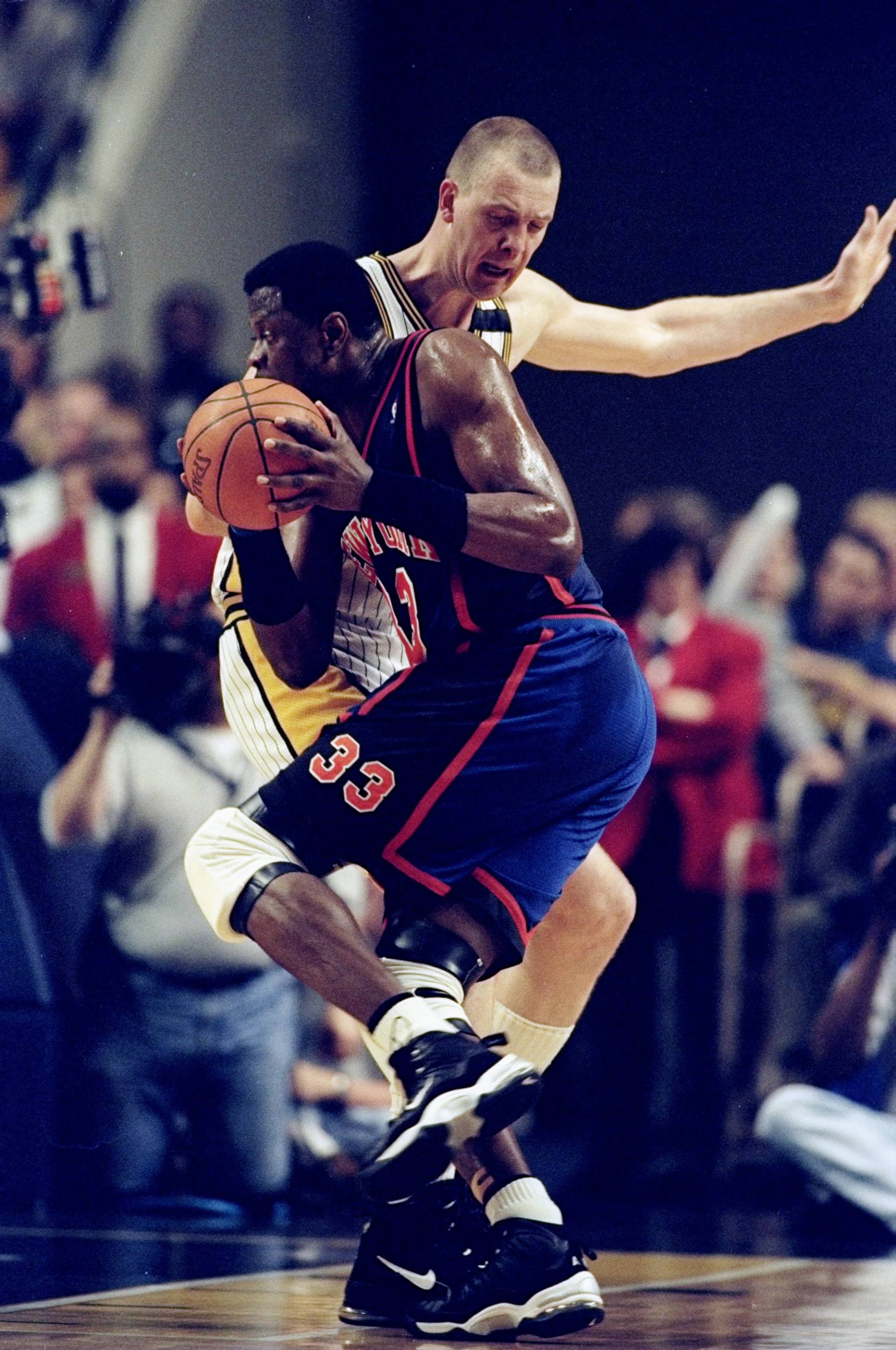 13 May 1998: Patrick Ewing #33 of the New York Knicks is blocked by Rik Smits #45 of the Indianapolis Pacers reaches to block at Market Square Arena in Indianapolis, Indiana. The Pacers defeated the Knicks 99-88. Mandatory Credit: Vincent Laforet  /Allspo