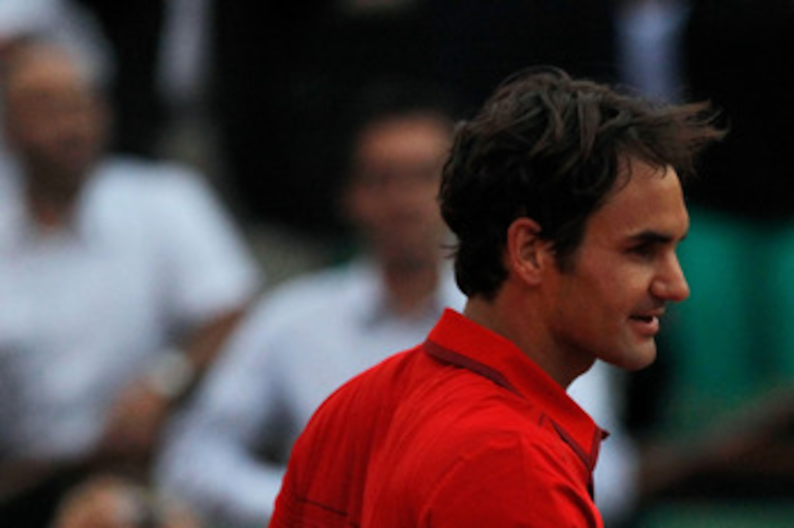 PARIS, FRANCE - JUNE 03:  Roger Federer of Switzerland is congratulated by Novak Djokovic of Serbia following his victory during the men's singles semi final match between Roger Federer of Switzerland and Novak Djokovic of Serbia on day thirteen of the Fr