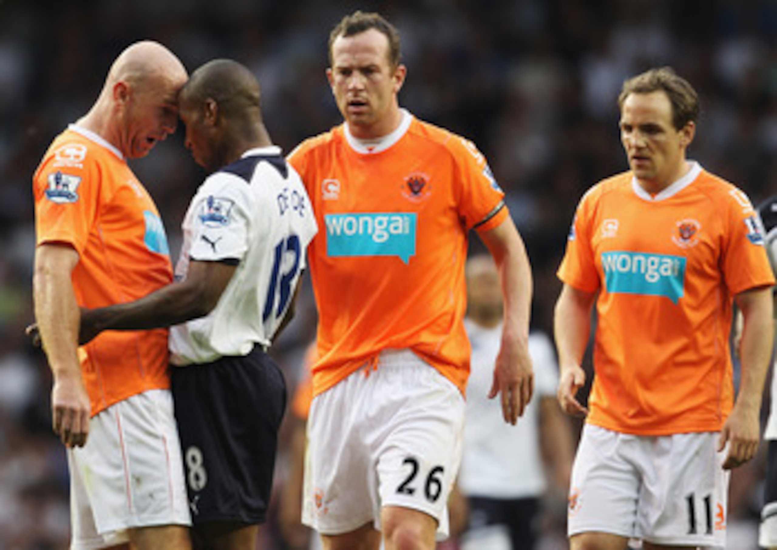 LONDON, UNITED KINGDOM - MAY 07:  Stephen Crainey of Blackpool clashes with Jermain Defoe of Spurs during the Barclays Premier League match between Tottenham Hotspur and Blackpool at White Hart Lane on May 7, 2011 in London, England.  (Photo by Scott Heav