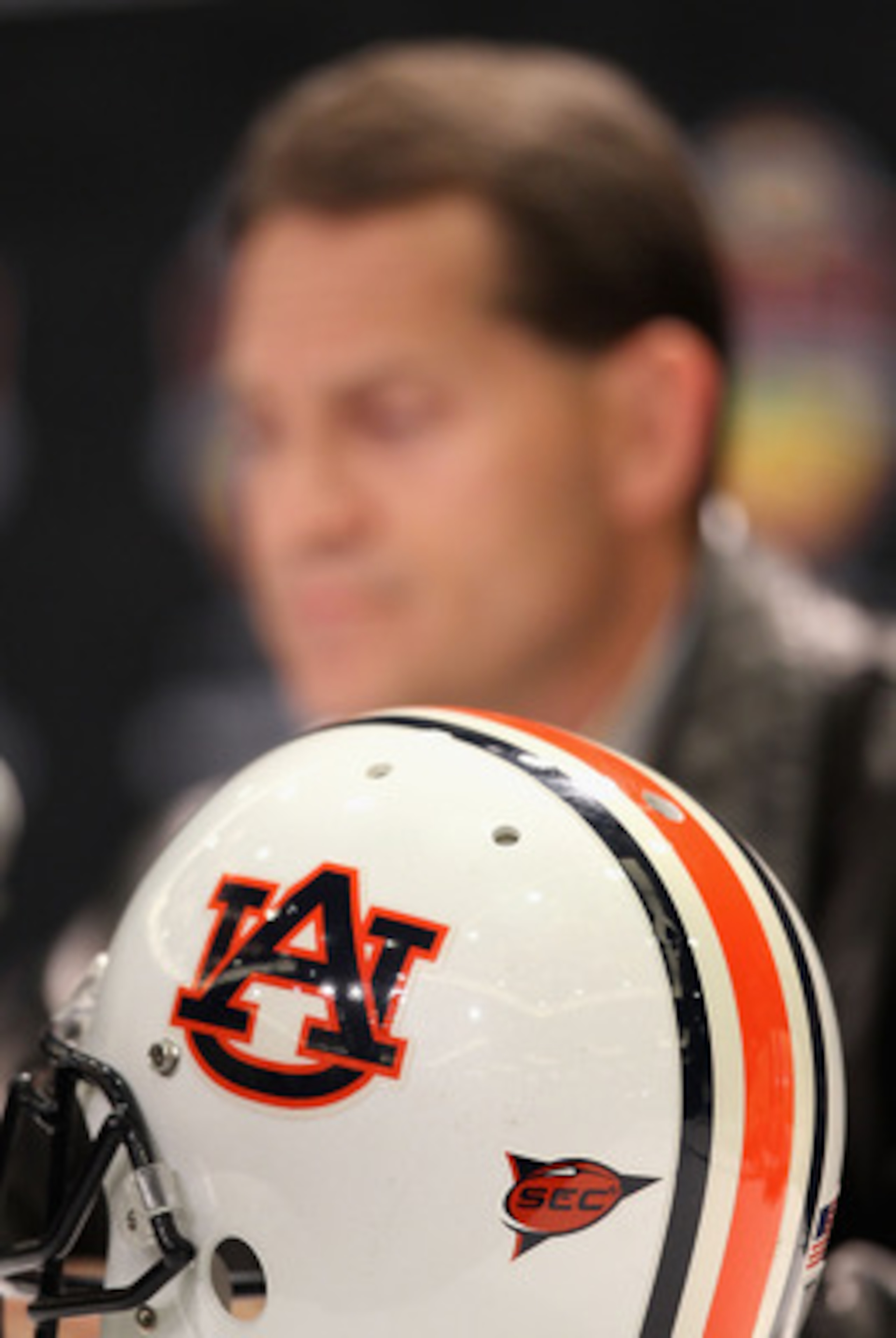 SCOTTSDALE, AZ - JANUARY 11:  Head coach Gene Chizik of the Auburn Tigers speaks to the media during a press conference for the Tostitos BCS National Championship Game at the JW Marriott Camelback Inn on January 11, 2011 in Scottsdale, Arizona.  (Photo by