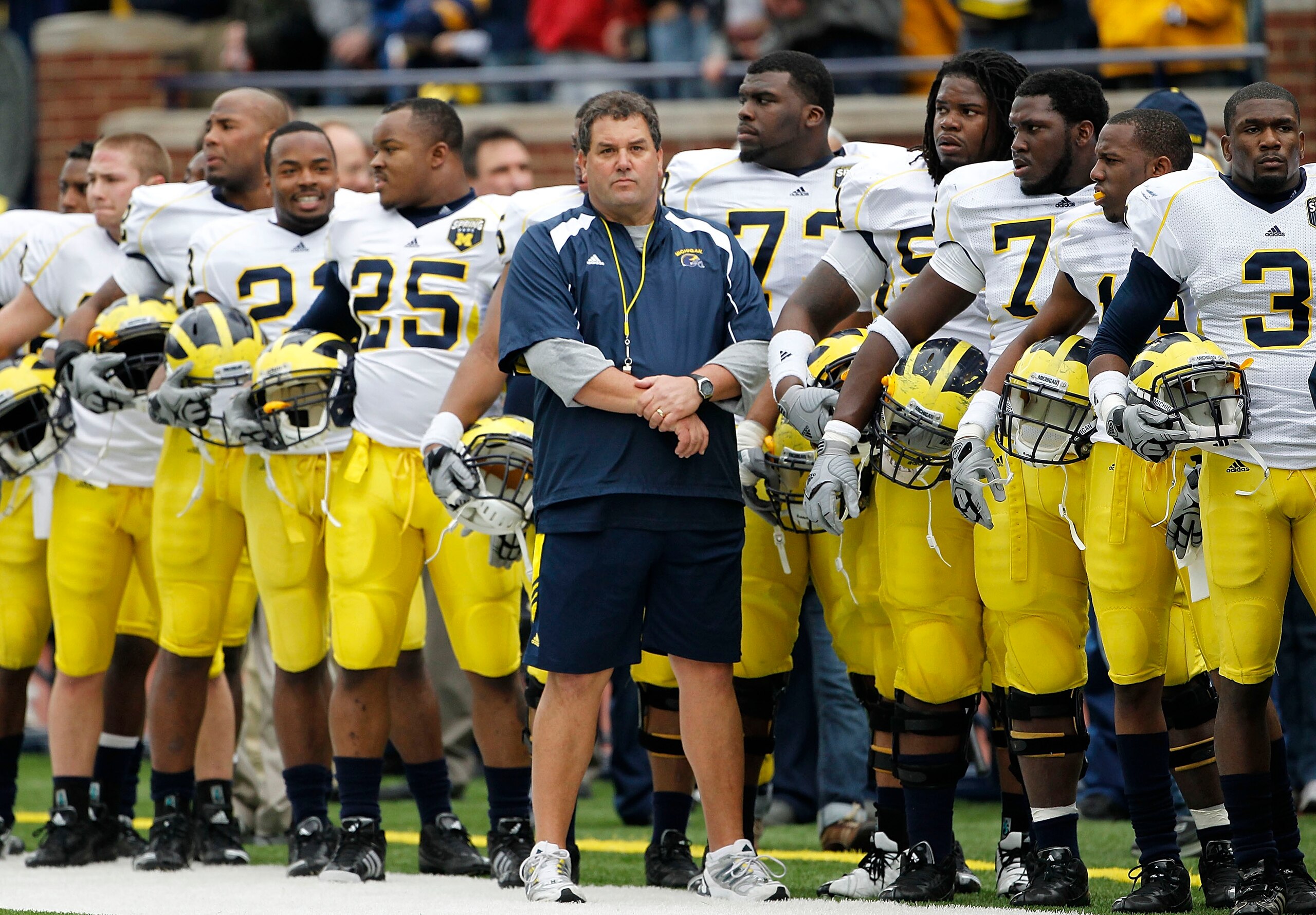 ANN ARBOR, MI - APRIL 16:  Head football coach Brady Hoke stands with his team prior to the start of the annual Spring Game at Michigan Stadium on April 16, 2011 in Ann Arbor, Michigan.  (Photo by Leon Halip/Getty Images)