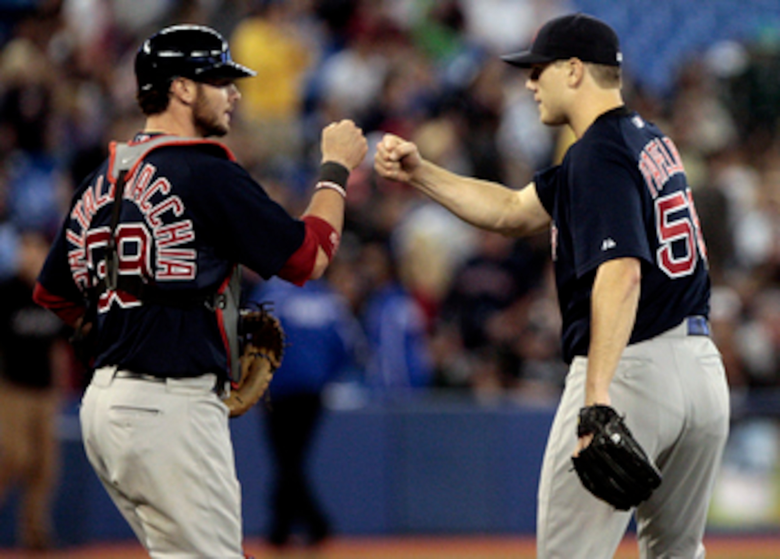 TORONTO, CANADA - JUNE 10:  Jarrod Saltalamacchia #39 and Jonathan Papelbon #58 of the Boston Red Sox celebrate their win during MLB action against the Toronto Blue Jays at The Rogers Centre June 10, 2011 in Toronto, Ontario, Canada. (Photo by Abelimages/