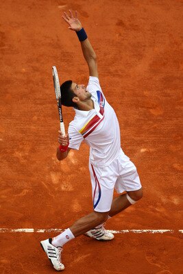 PARIS, FRANCE - JUNE 03:  Novak Djokovic of Serbia serves during the men's singles semi final match between Roger Federer of Switzerland and Novak Djokovic of Serbia on day thirteen of the French Open at Roland Garros on June 3, 2011 in Paris, France.  (P