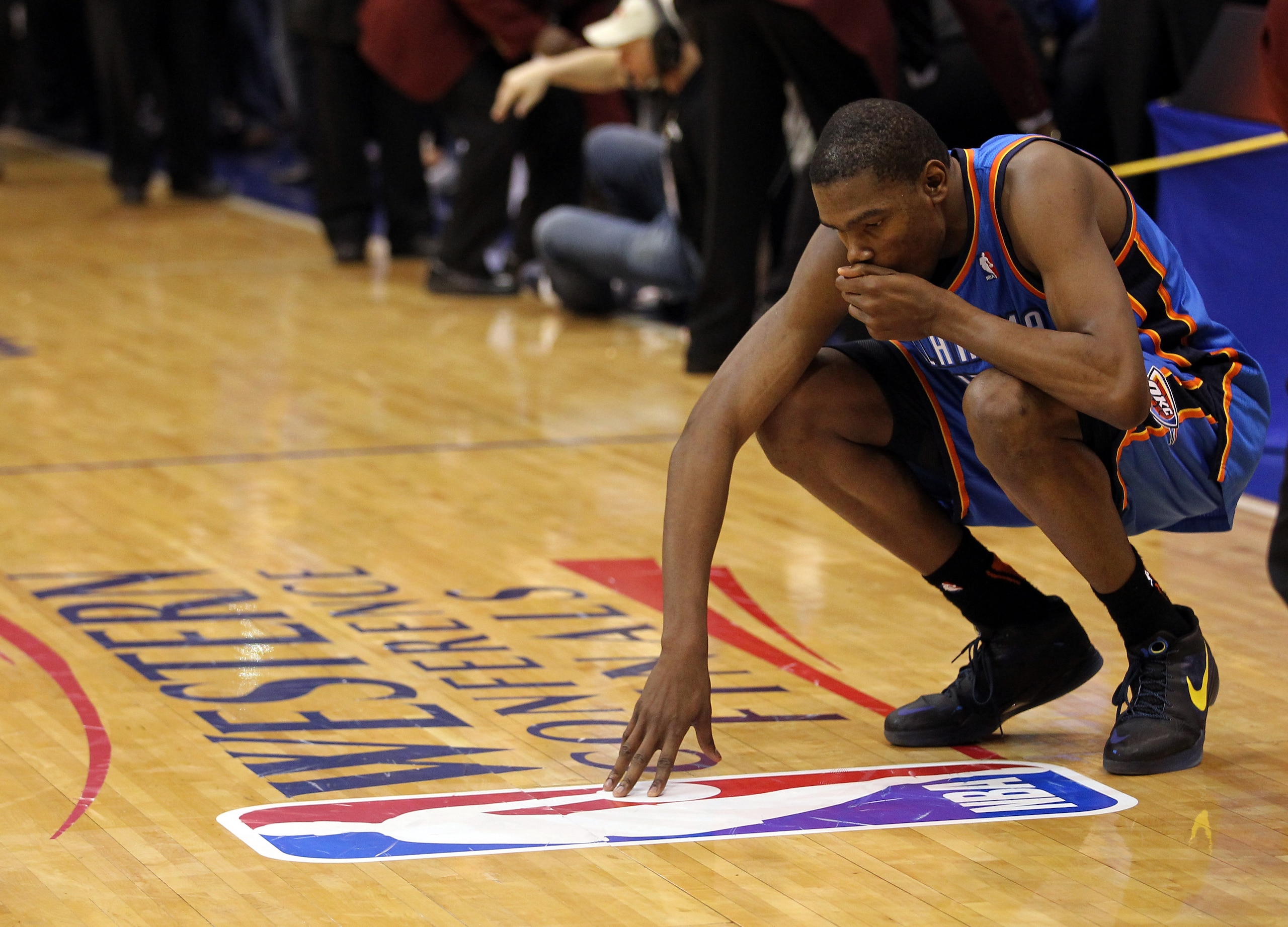 DALLAS, TX - MAY 25:  Kevin Durant #35 of the Oklahoma City Thunder reacts after the Thunder were defeated by the Dallas Mavericks 100-96 in Game Five of the Western Conference Finals during the 2011 NBA Playoffs at American Airlines Center on May 25, 201