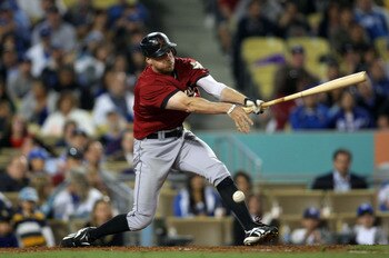 LOS ANGELES, CA - JUNE 17:  Hunter Pence #9 of the Houston Astros hits an infield ground ball in the top of the sixth inning during the MLB game against the Los Angeles Dodgers at Dodger Stadium on June 17, 2011 in Los Angeles, California.  (Photo by Vict