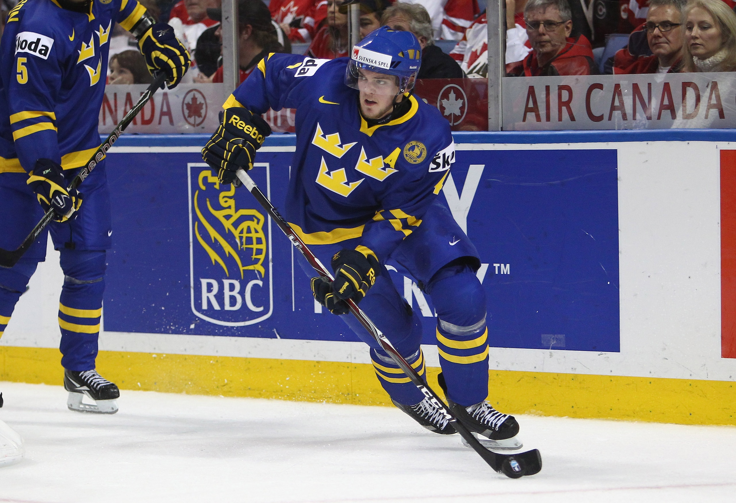 BUFFALO, NY - DECEMBER 31: Defenseman Tim Erixon #4 of Sweden carries the puck during the 2011 IIHF World U20 Championship game between Canada and Sweden on December 31, 2010 at HSBC Arena in Buffalo, New York. (Photo by Tom Szczerbowski/Getty Images)