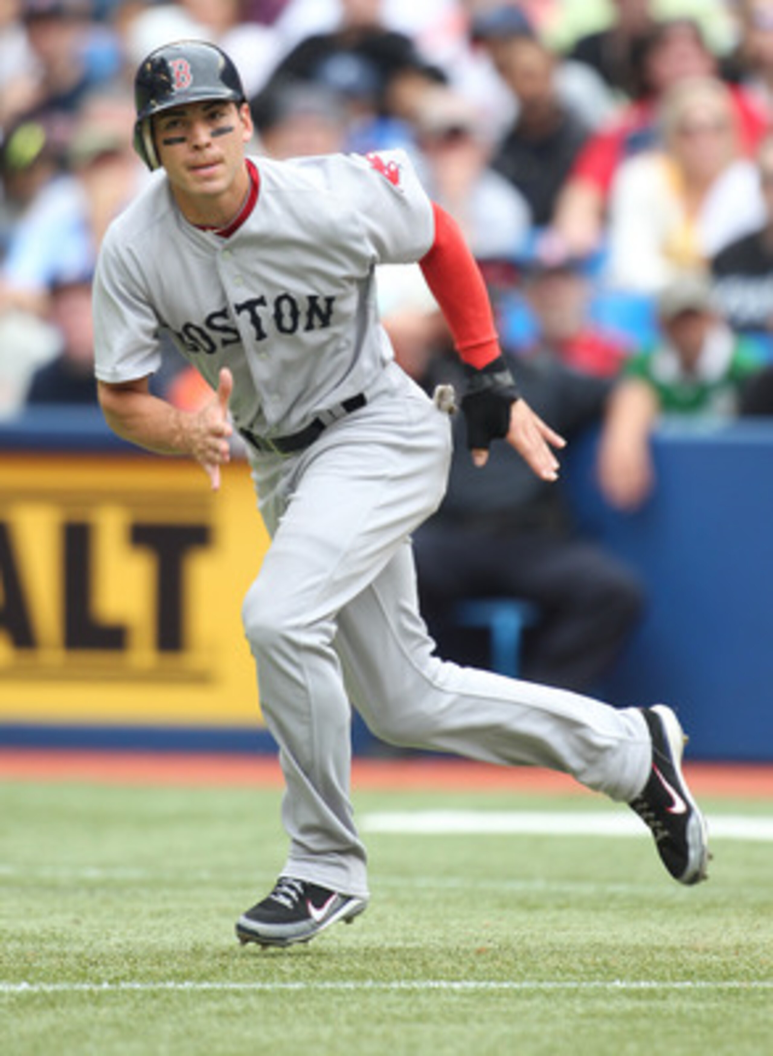 TORONTO, CANADA - JUNE 11:  Jacoby Ellsbury #2 of the Boston Red Sox takes off to second against the Toronto Blue Jays in a MLB game on June 11, 2011 at the Rogers Centre in Toronto, Ontario, Canada.  (Photo by Claus Andersen/Getty Images)