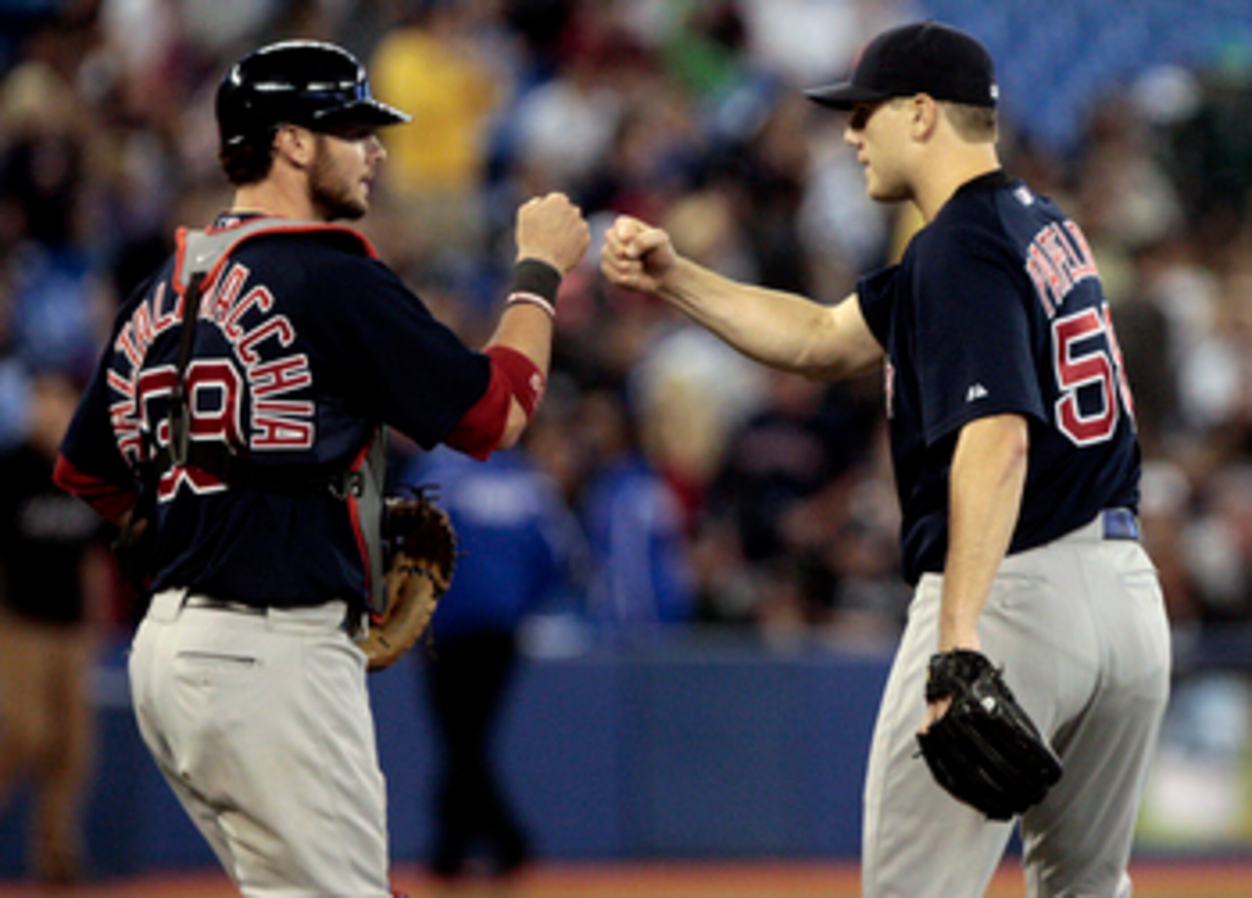 TORONTO, CANADA - JUNE 10:  Jarrod Saltalamacchia #39 and Jonathan Papelbon #58 of the Boston Red Sox celebrate their win during MLB action against the Toronto Blue Jays at The Rogers Centre June 10, 2011 in Toronto, Ontario, Canada. (Photo by Abelimages/