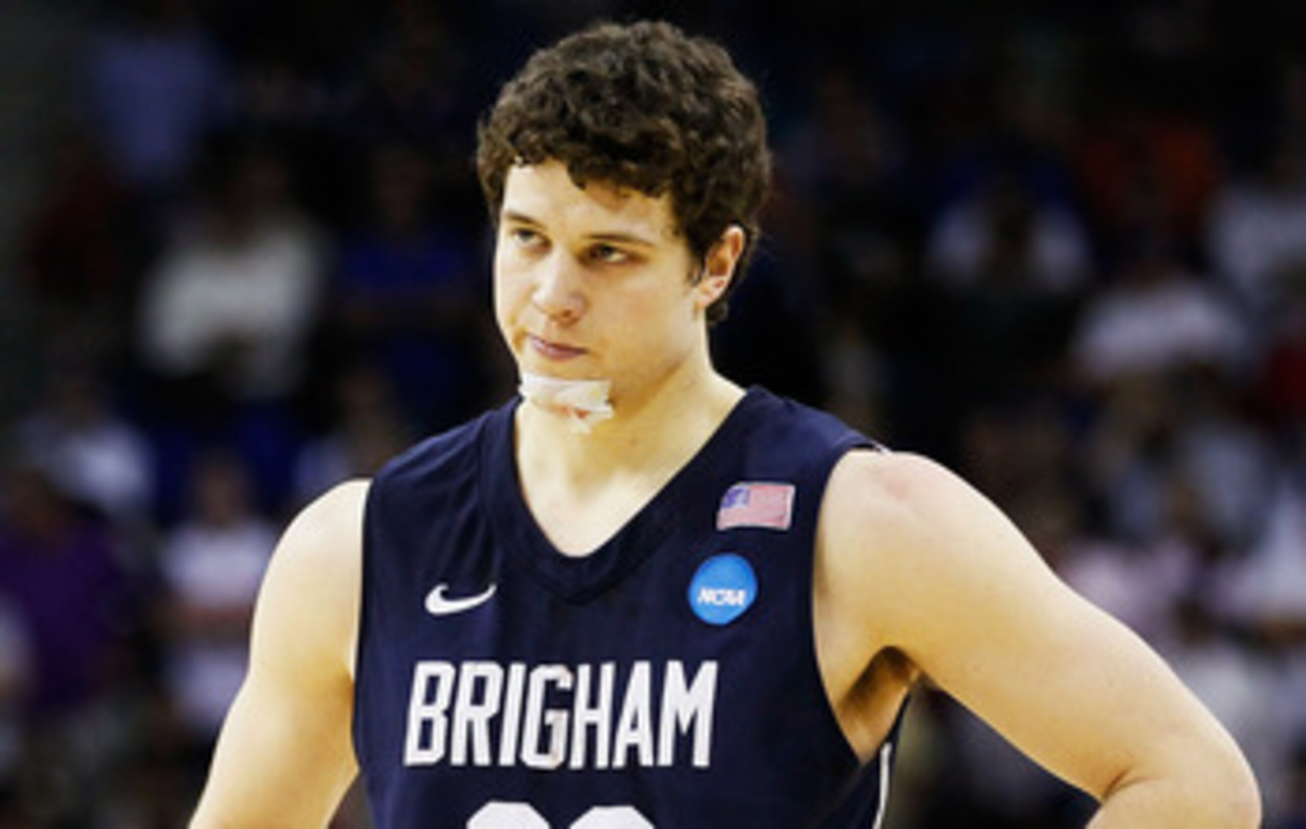 NEW ORLEANS, LA - MARCH 24:  Jimmer Fredette #32 of the Brigham Young Cougars reacts during their 74 to 83 loss to the Florida Gators in the Southeast regional of the 2011 NCAA men's basketball tournament at New Orleans Arena on March 24, 2011 in New Orle