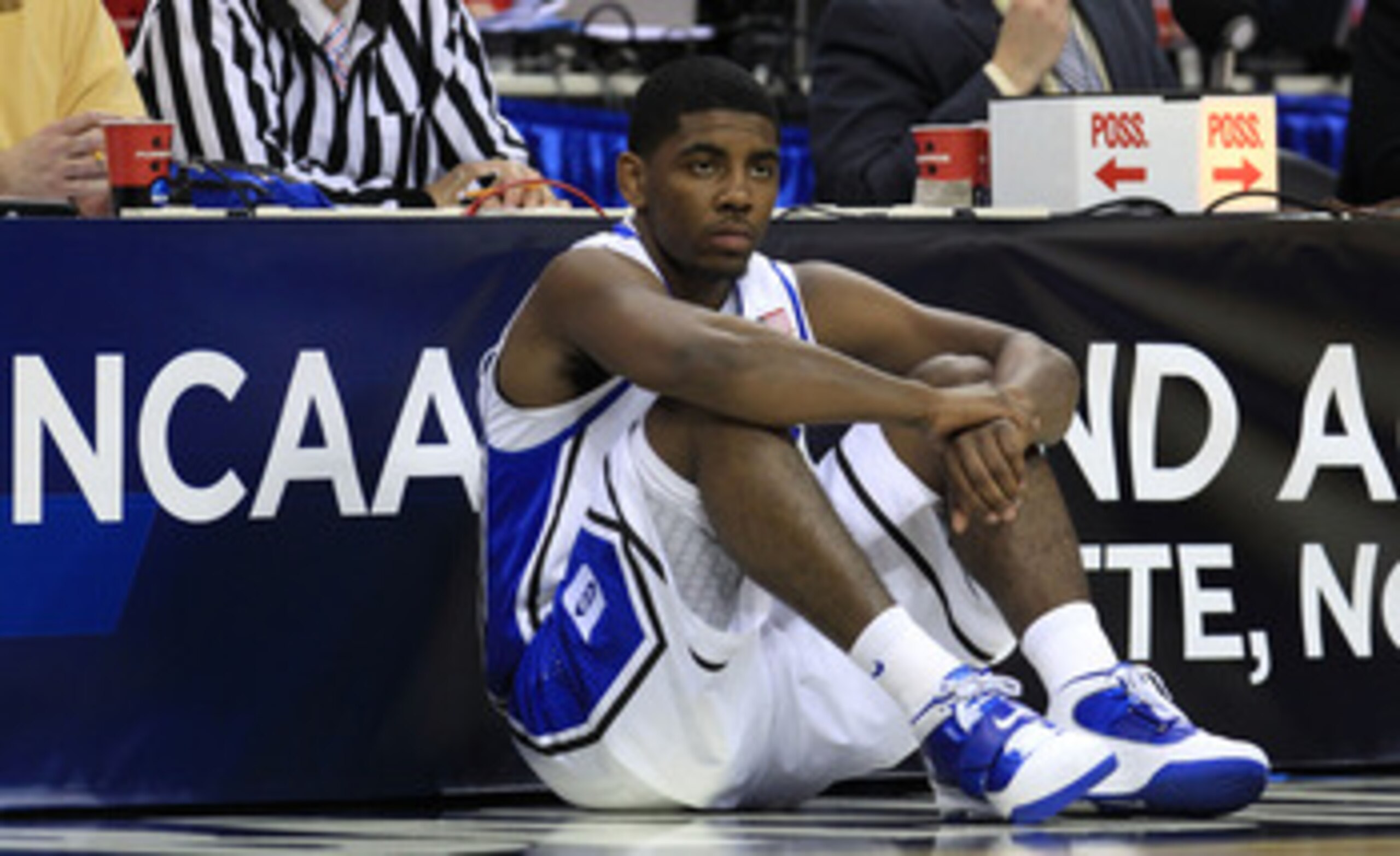 CHARLOTTE, NC - MARCH 20:  Kyrie Irving #1 of the Duke Blue Devils waits to enter the game while taking on the Michigan Wolverines during the third round of the 2011 NCAA men's basketball tournament at Time Warner Cable Arena on March 20, 2011 in Charlott