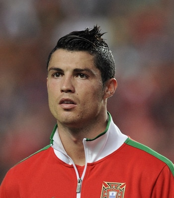 LISBON, PORTUGAL - JUNE 04:  Cristiano Ronaldo of Portugal lines up before the start of the EURO 2012 Group H qualifier between Portugal and Norway at Estadio do Sport Lisboa e Benfica on June 4, 2011 in Lisbon, Portugal.  (Photo by Denis Doyle/Getty Imag