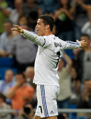 MADRID, SPAIN - MAY 10: Cristiano Ronaldo of Real Madrid celebrates after scoring his side opening goal during the La Liga match between Real Madrid and Getafe at Estadio Santiago Bernabeu on May 10, 2011 in Madrid, Spain. (Photo by Angel Martinez/Getty I