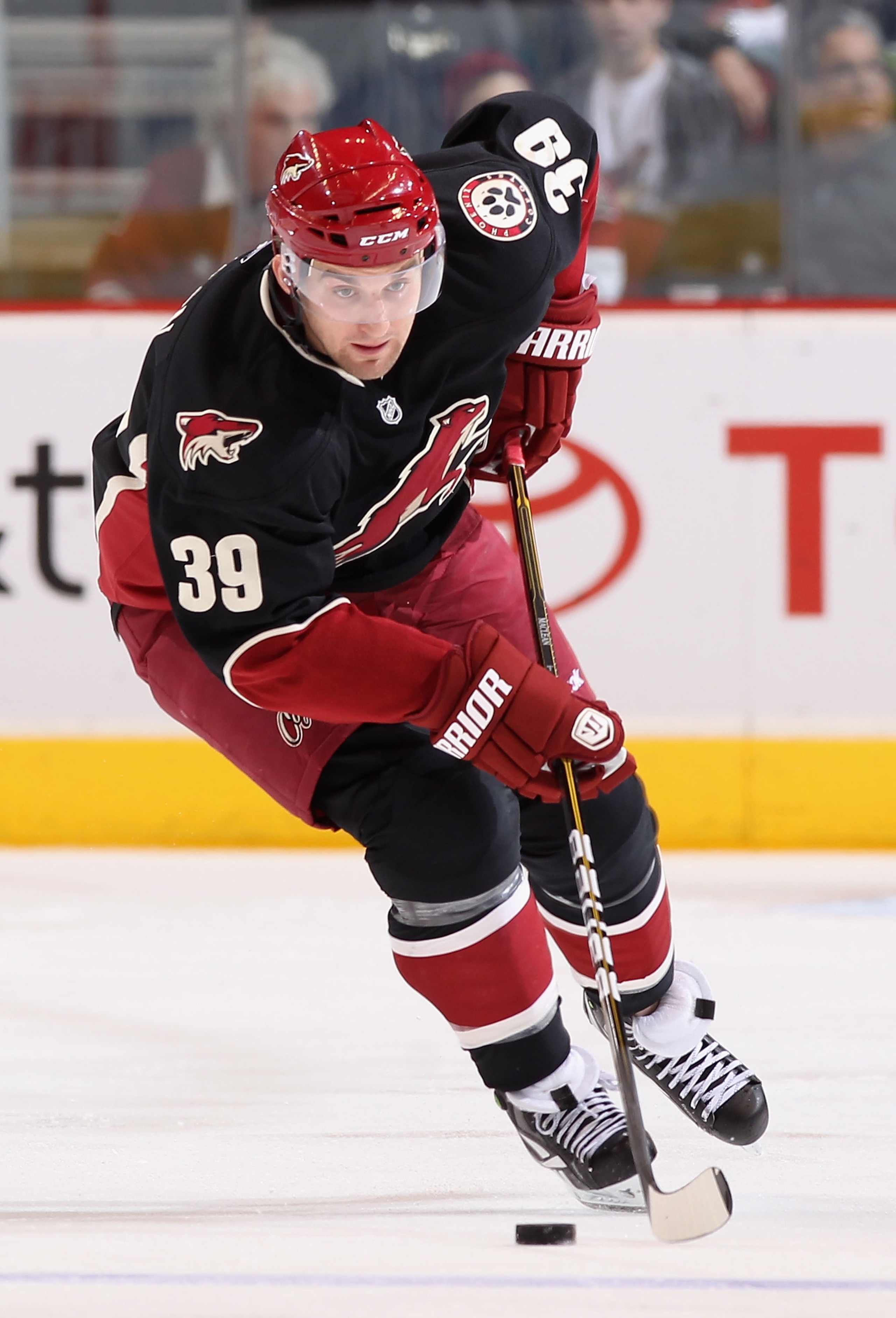 GLENDALE, AZ - MARCH 29:  Brett MacLean #39 of the Phoenix Coyotes skates with the puck during the NHL game against the Dallas Stars at Jobing.com Arena on March 29, 2011 in Glendale, Arizona.  The Coyotes defeated the Stars 2-1 in an overtime shoot out.