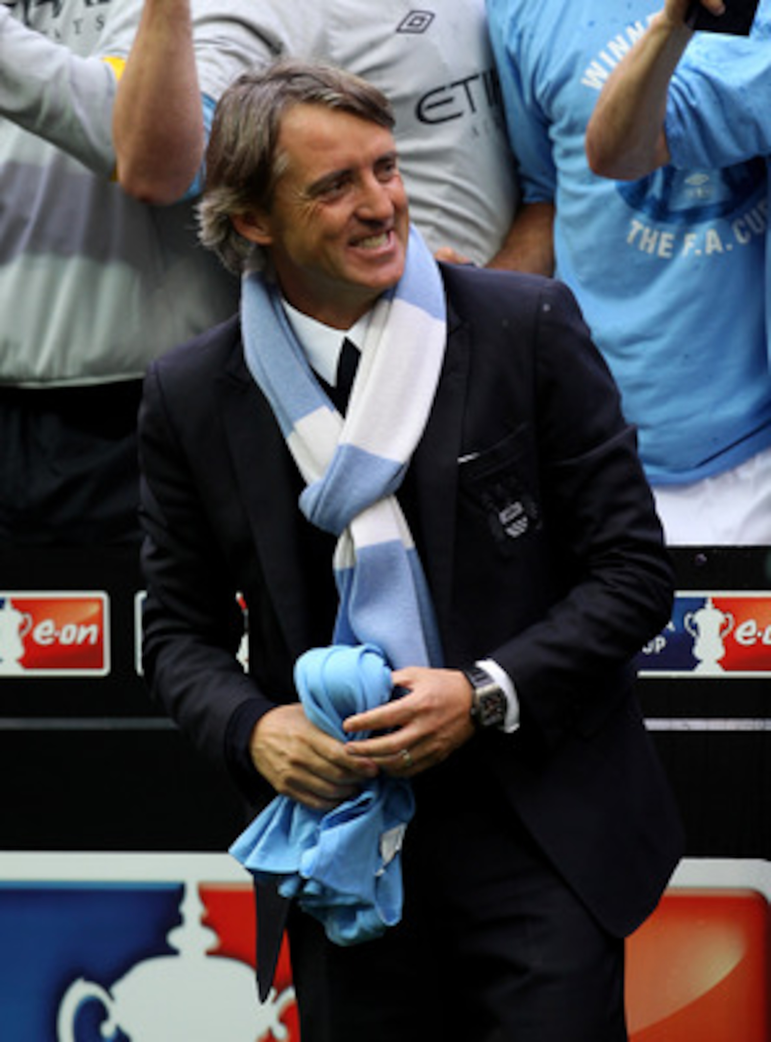 LONDON, ENGLAND - MAY 14: Roberto Mancini smiles after his Manchester City team won the FA Cup sponsored by E.ON Final match between Manchester City and Stoke City at Wembley Stadium on May 14, 2011 in London, England. (Photo by Alex Livesey/Getty Image LONDON, ENGLAND - MAY 14: Roberto Mancini smiles after his Manchester City team won the FA Cup sponsored by E.ON Final match between Manchester City and Stoke City at Wembley Stadium on May 14, 2011 in London, England. (Photo by Alex Livesey/Getty Image